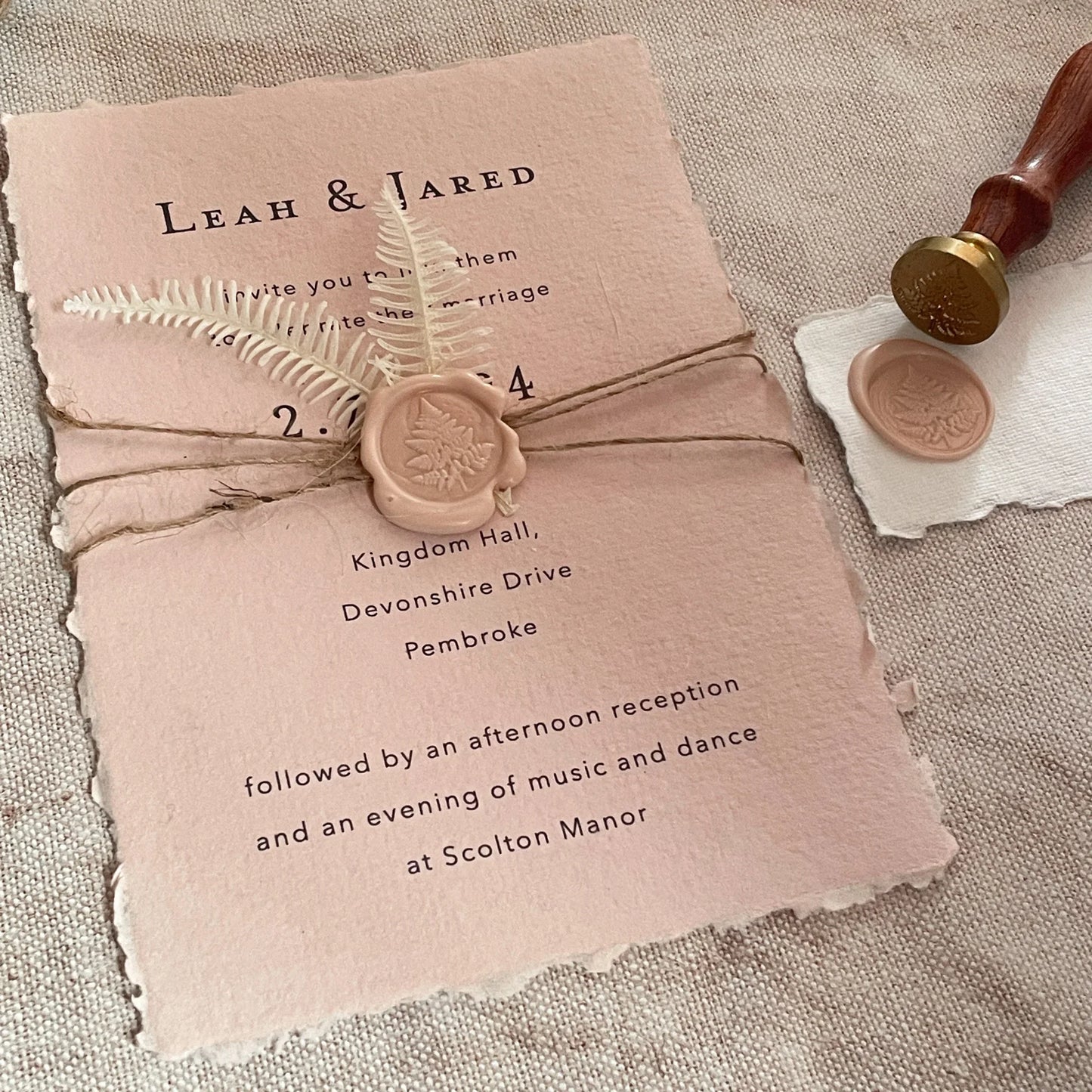 Easy DIY wedding invitation made from handmade paper, a fern leaf wax seal and jute string. Eco friendly wedding invitations. By The Natural Paper Company