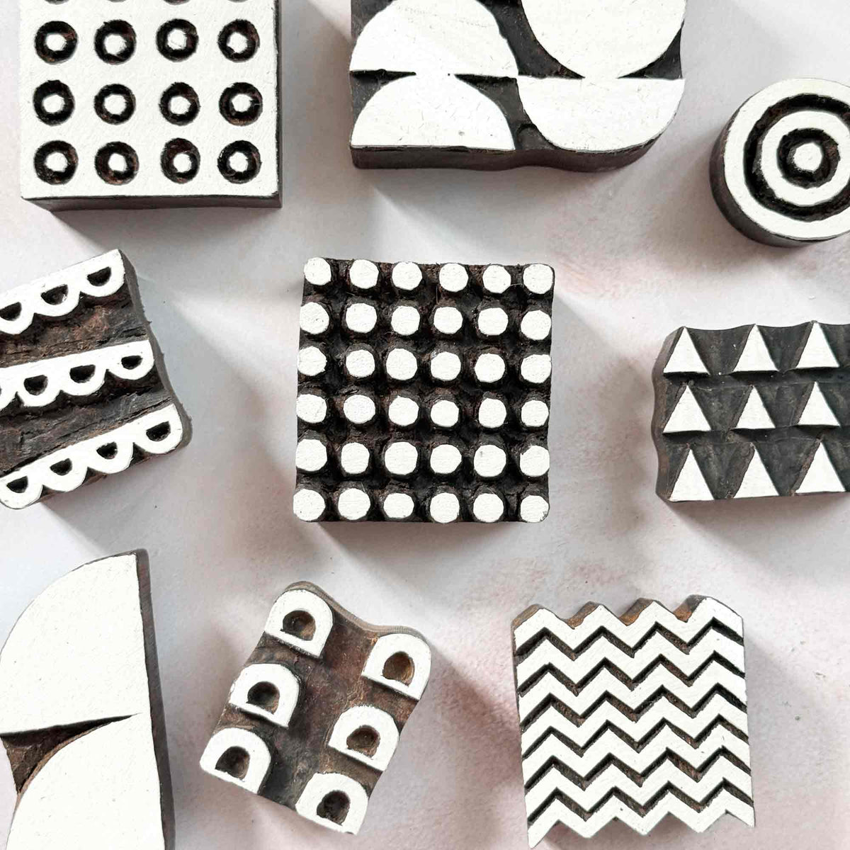 collection of indian wood block stamps with geometric designs