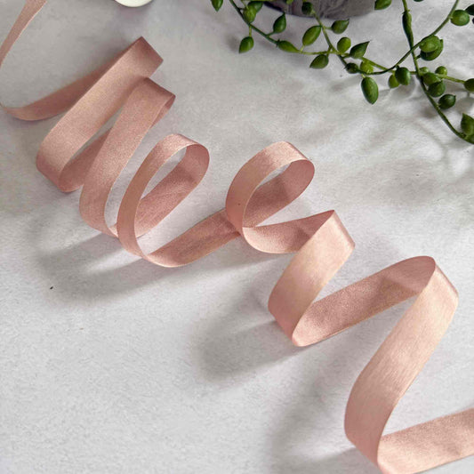 Narrow silk ribbon in a nude blush pink