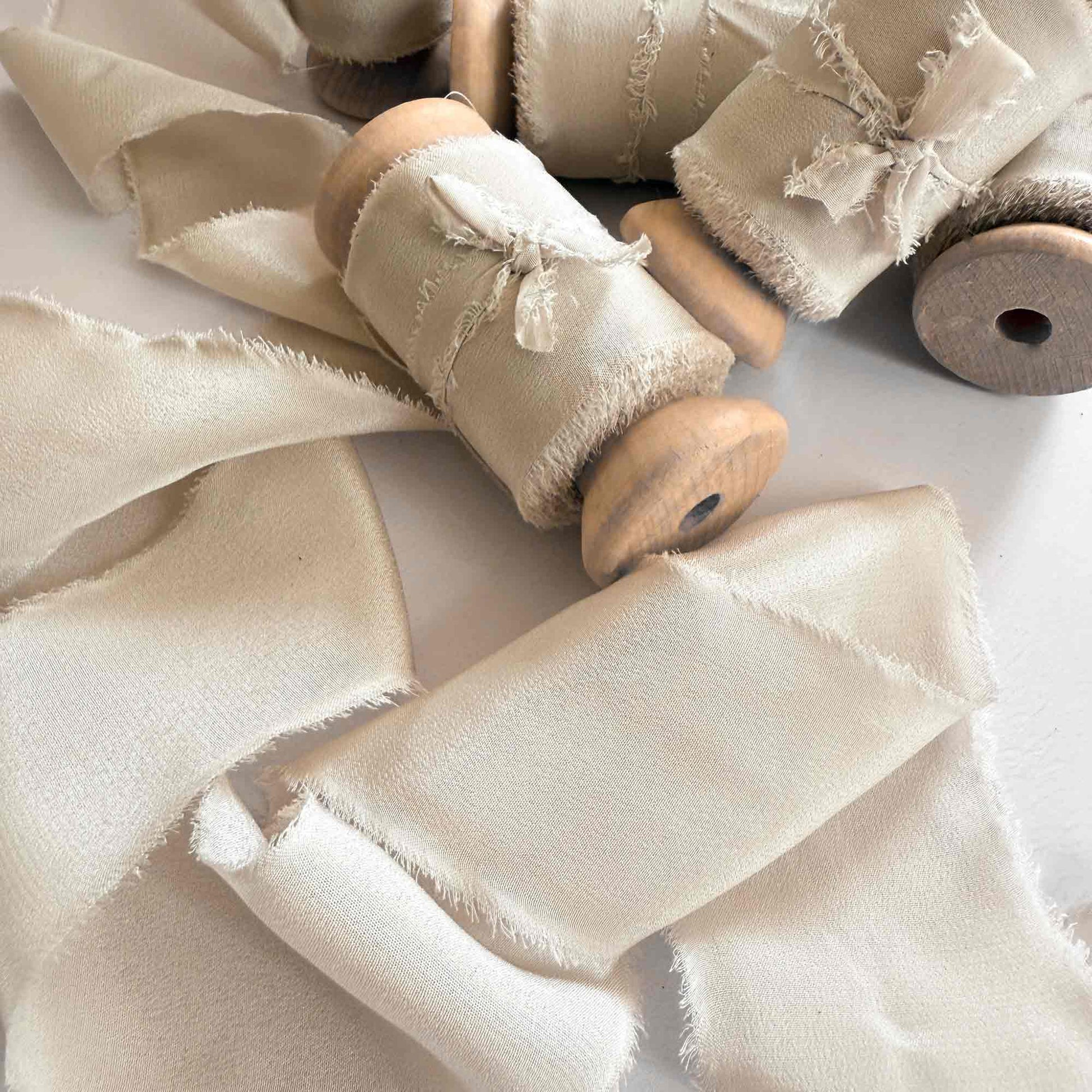Fine silk ribbon in a neutral beige colour