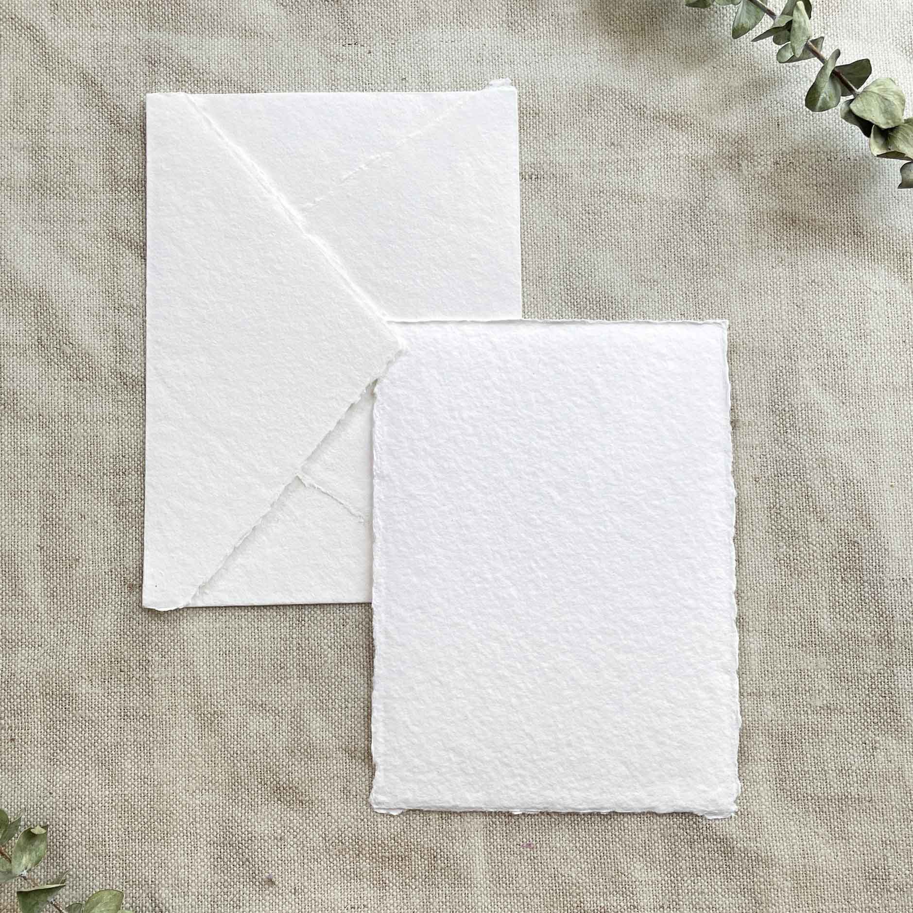 White handmade paper and envelope in white with deckled edges