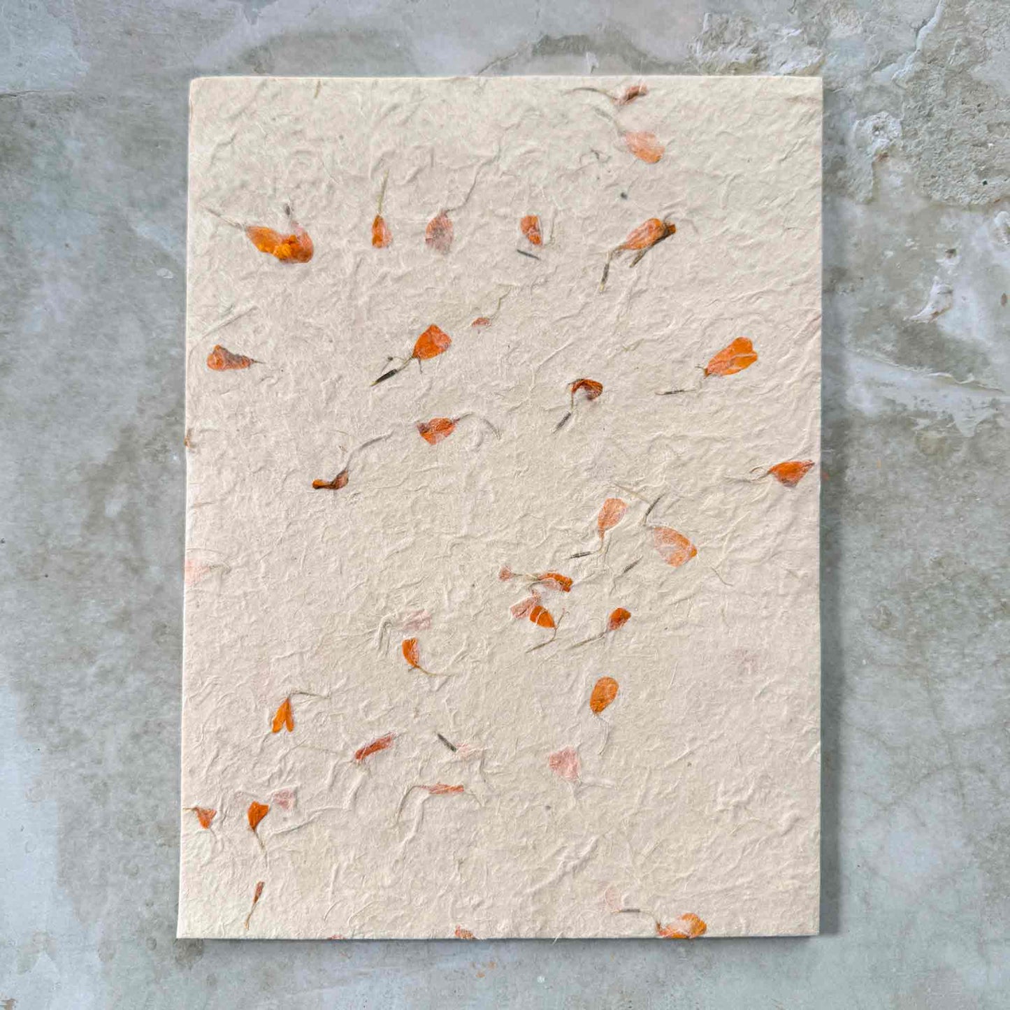 A4 handmade lokta paper with marigold flower petals