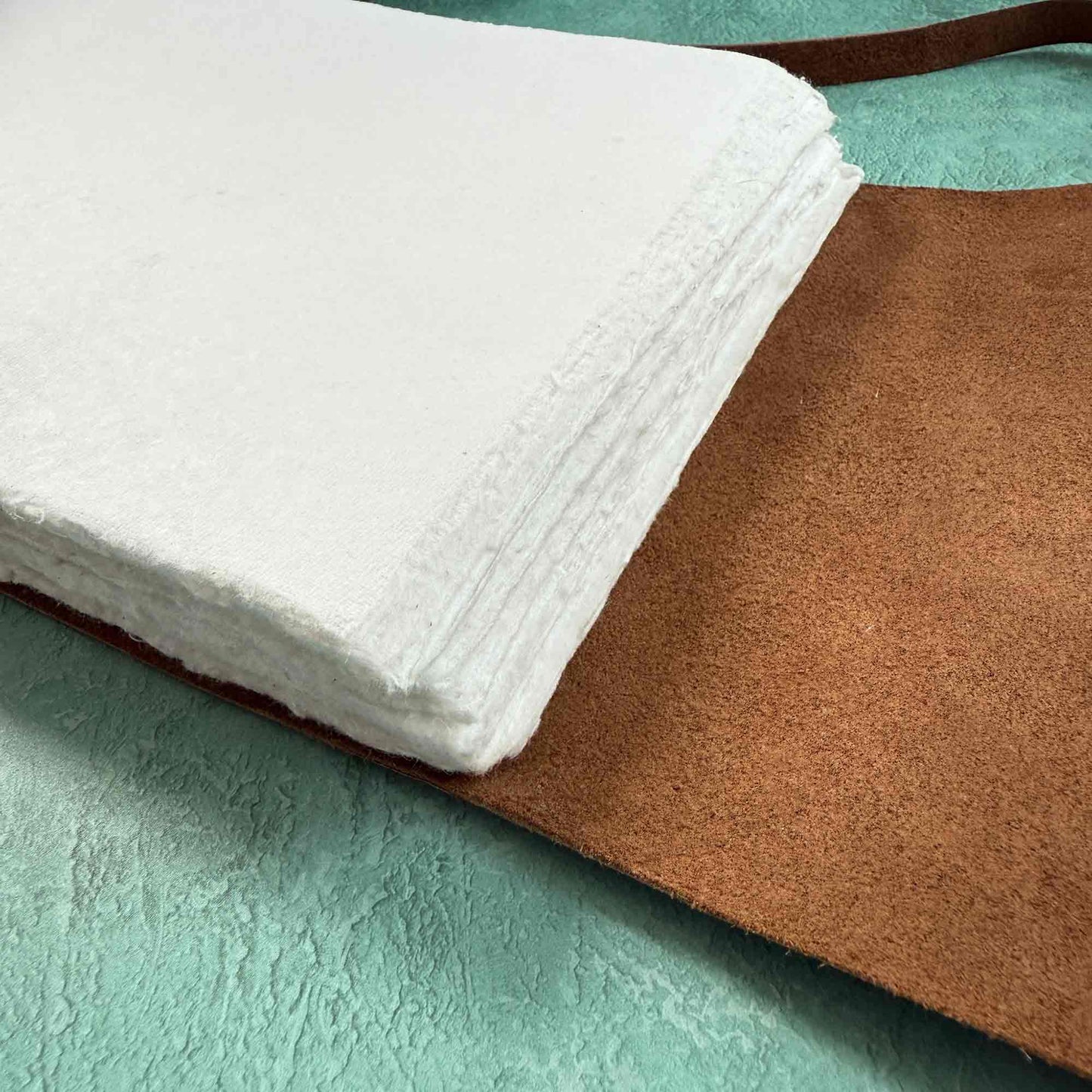 Brown leather notebook with blank cotton paper pages