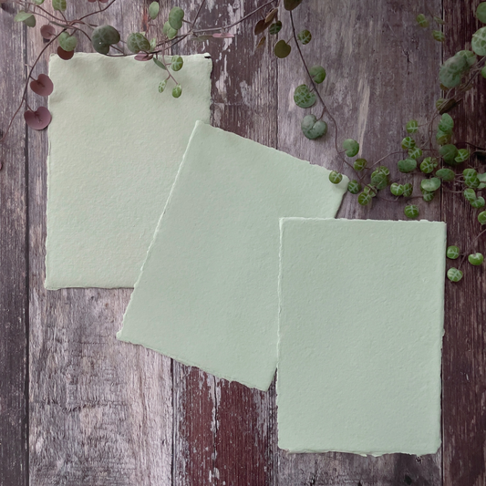 A5 handmade cotton rag card in sage green.  Recycled card with deckled edge.  Perfect for wedding invitations.