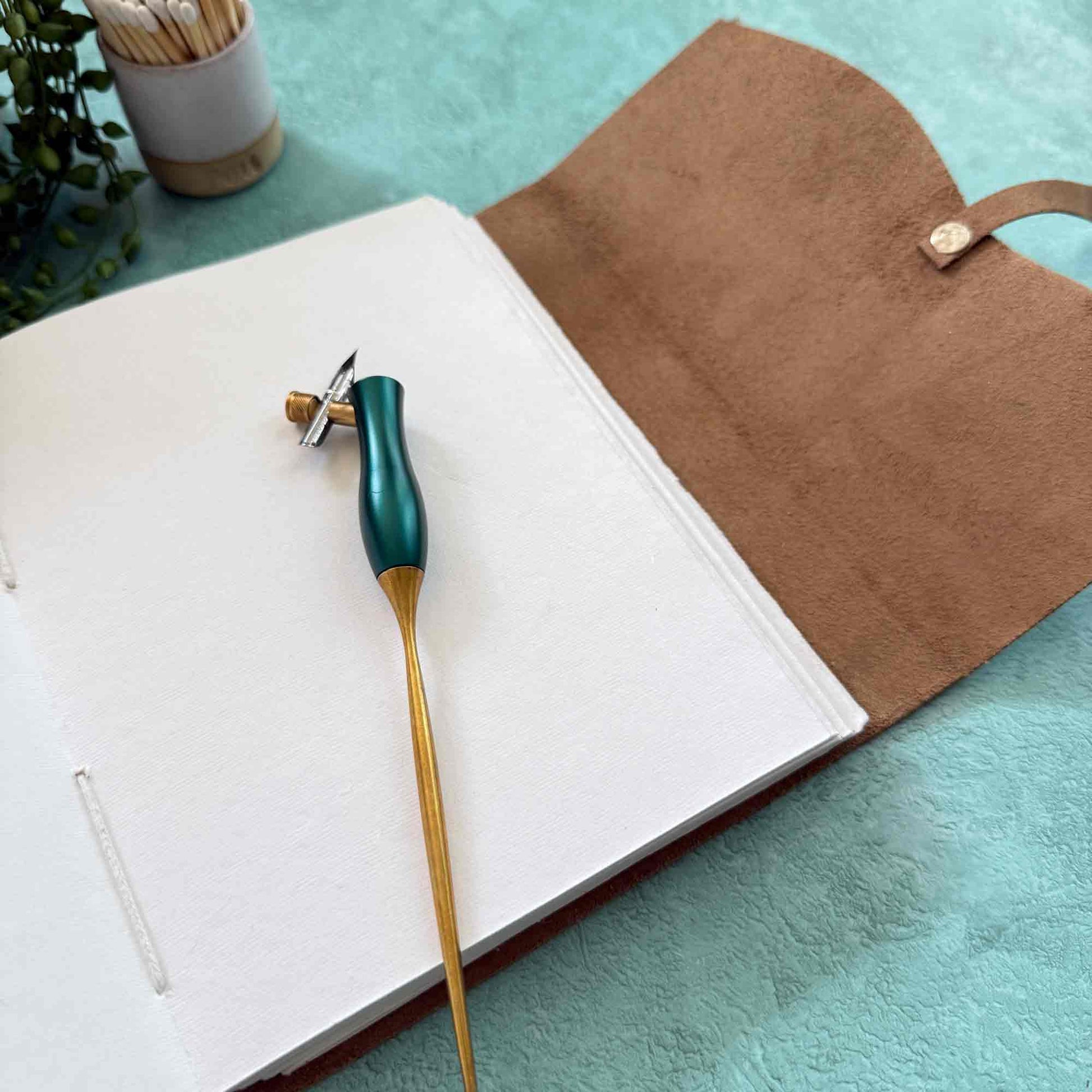 Handmade leather journal with blank cotton paper pages