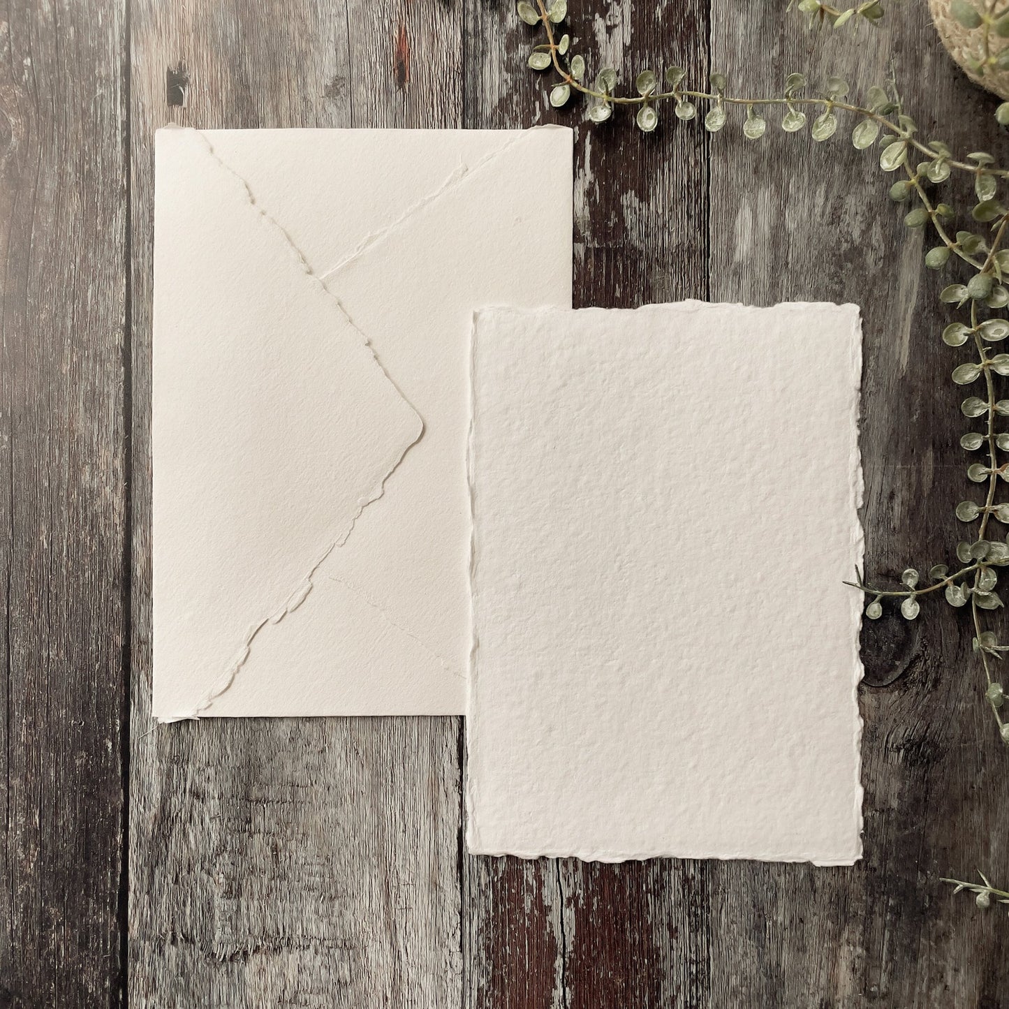 Handmade paper and envelope with deckled edges.  Made from recycled cotton rag fibres.  Premium quality white handmade paper and envelopes.  By The Natural paper Company