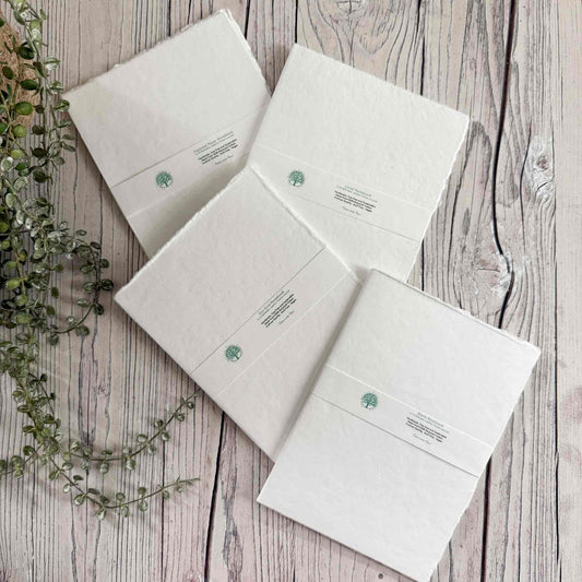 A5 refillable journal inserts made from handmade cotton paper in blank, lined, dot grid and square grid styles