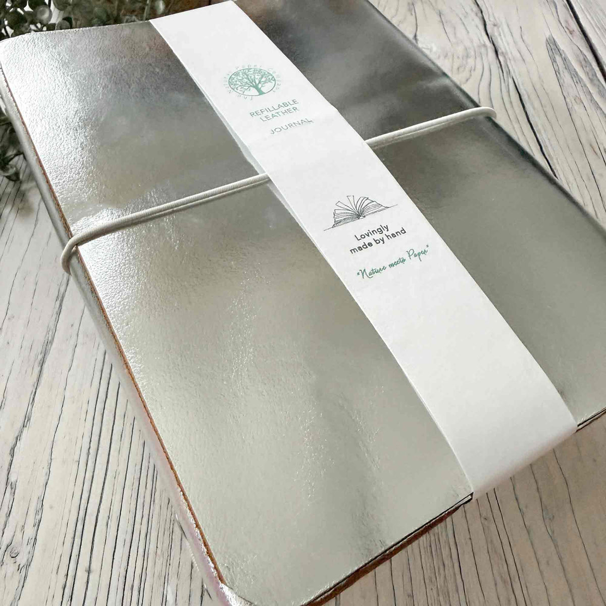 Handmade A5 metallic silver leather journal with refillable inserts and elastic closure