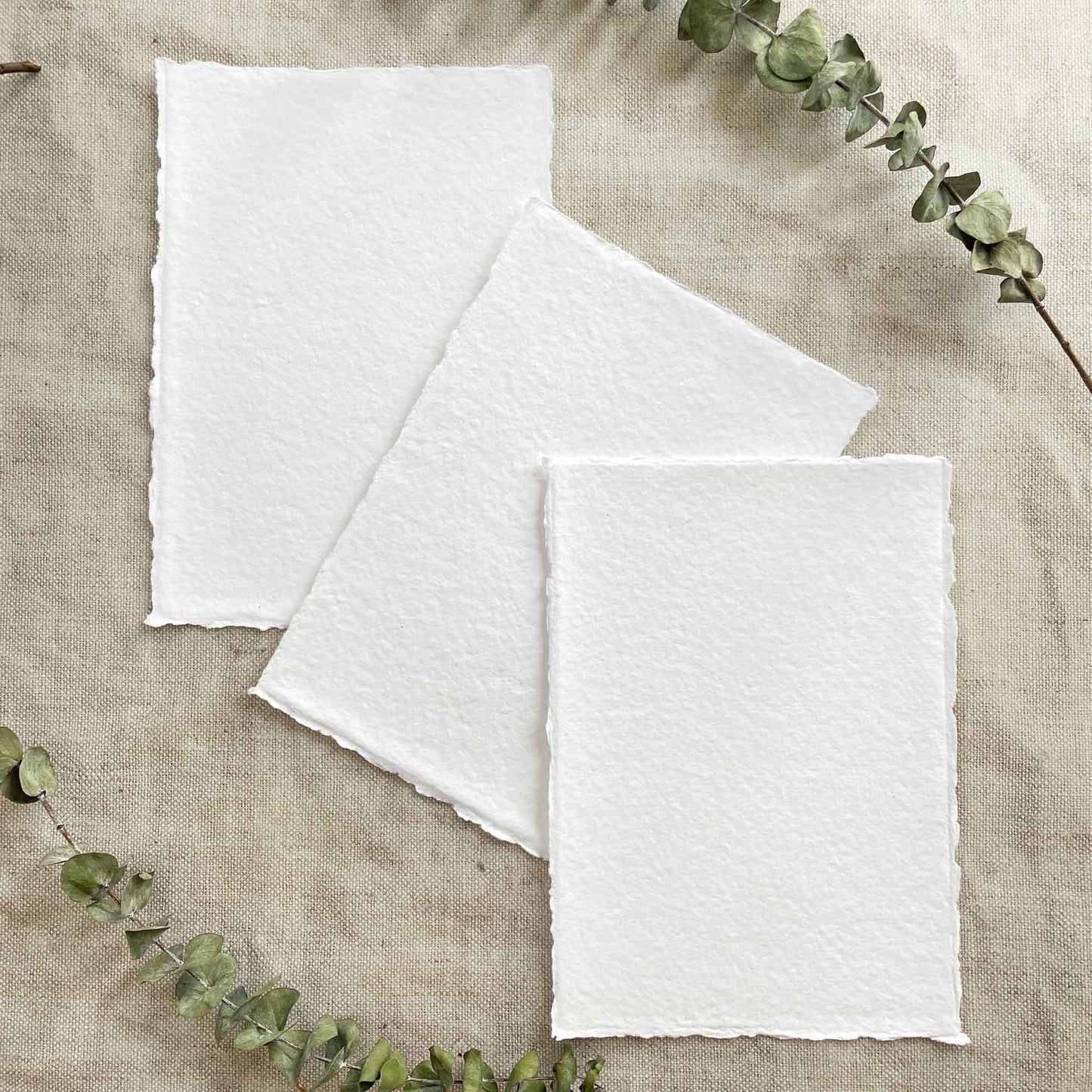 White handmade recycled cotton rag paper and card with deckled edges.  A5 size