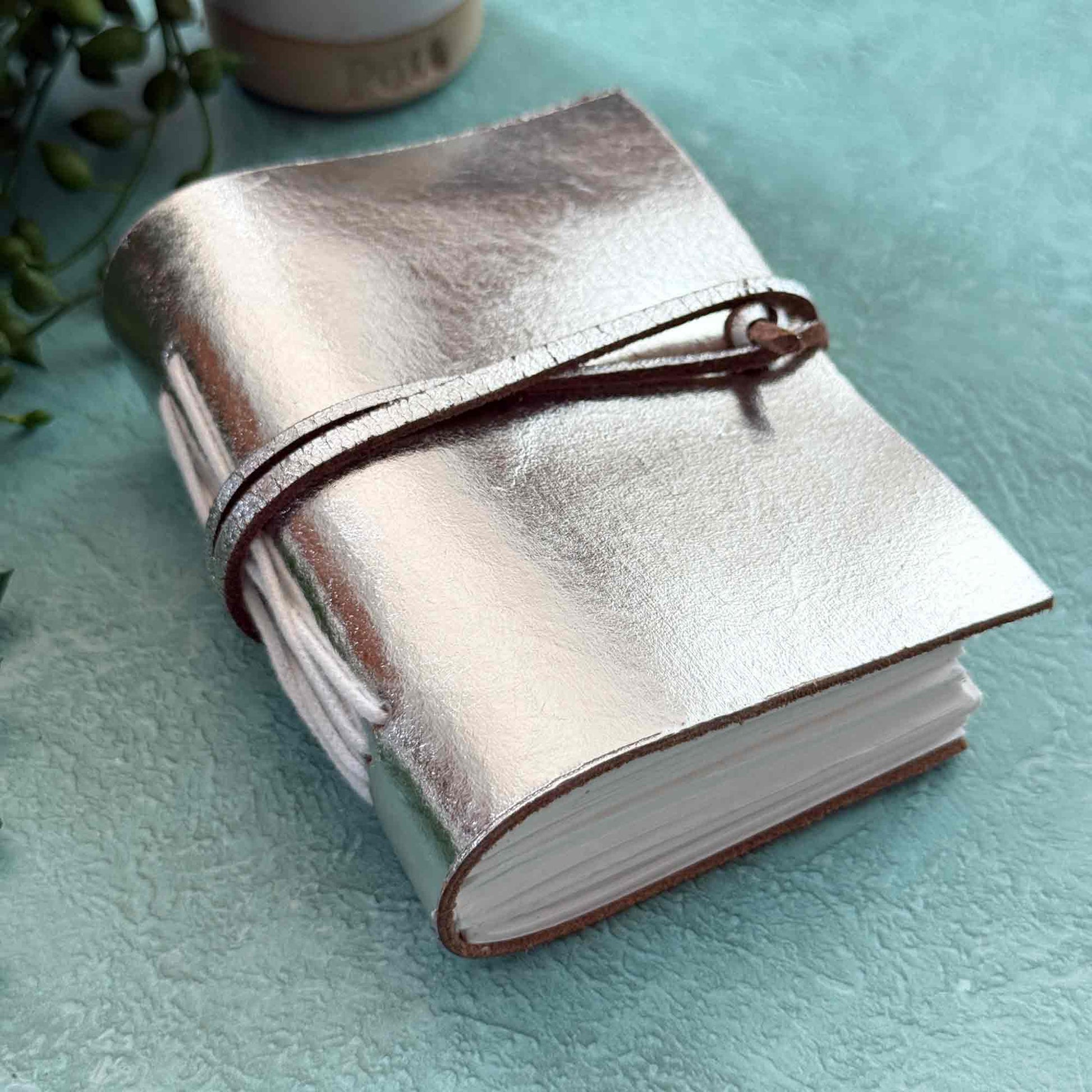 small silver leather journal made by hand