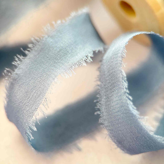 Close-up of Airforce Blue 10mm silk ribbon with soft raw edges