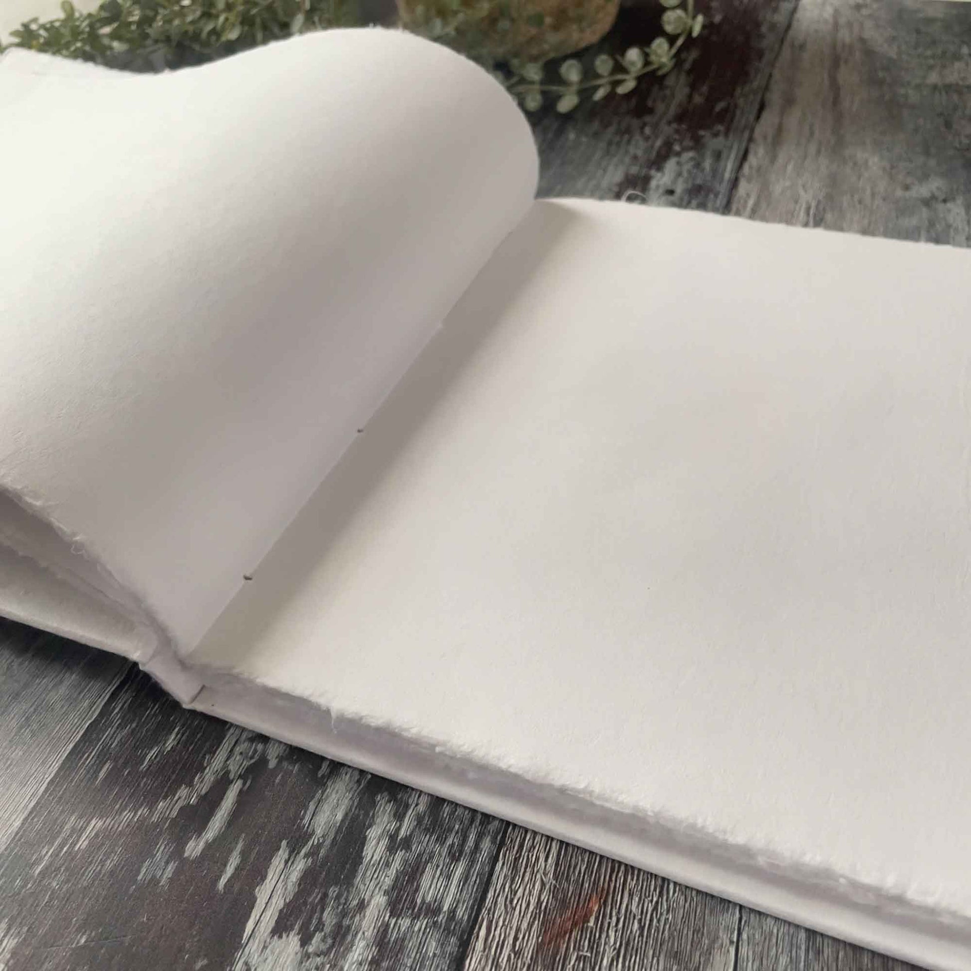 Recycled paper journal.  A4 blank notebook in white