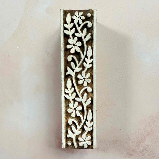 Decorative wooden stamp with floral pattern