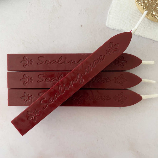 sealing wax sticks with wick.  Chestnut brown wax for making wax seals and stamps.