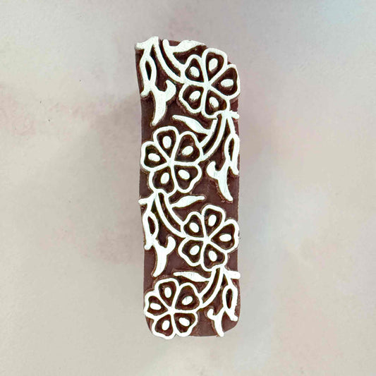 Decorative wooden stamp with floral patterns