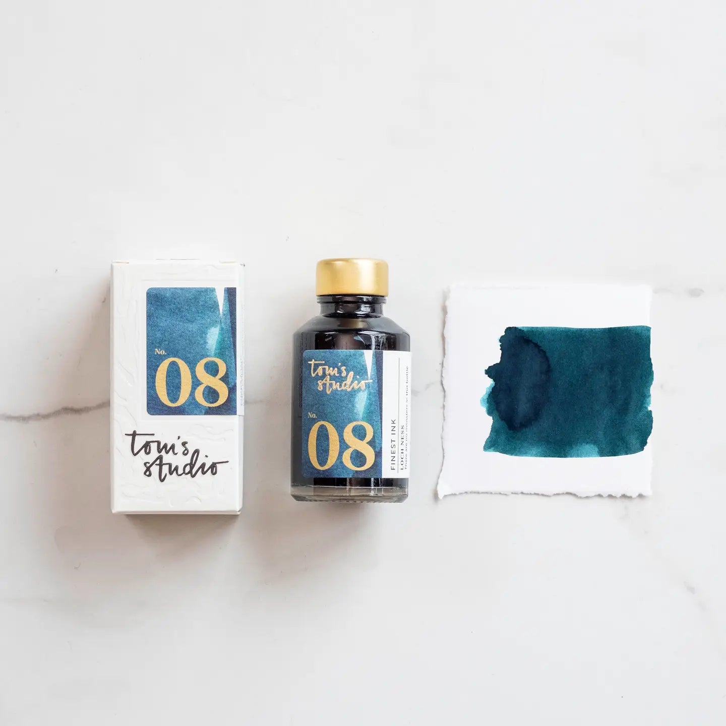 Green blue water based ink for calligraphy and illustration.  Tom's studio Loch Ness colour ink in a glass bottle.  Perfect for refilling fountain pens, fineliners and calligraphy pens.