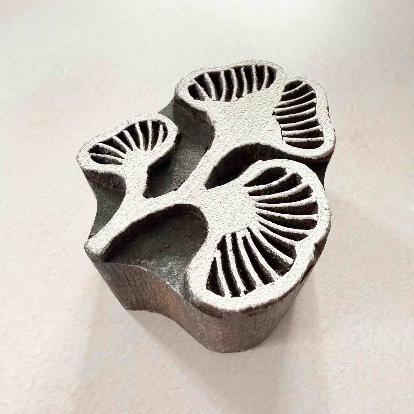 Kelp Traditional Printing Block showing three flowing leaf and seaweed-inspired motifs in hand-carved wood.