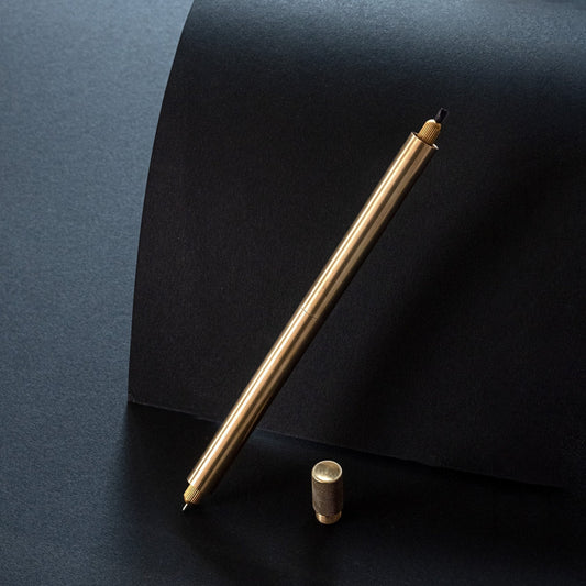 brass artists pen with changeable nibs and refillable cartridge.  A perfectly balanced pen in brass with a knurled lid.  Suitable for illustrators, calligraphers, writers and artists.  Limited edition pen by Tom's Studio