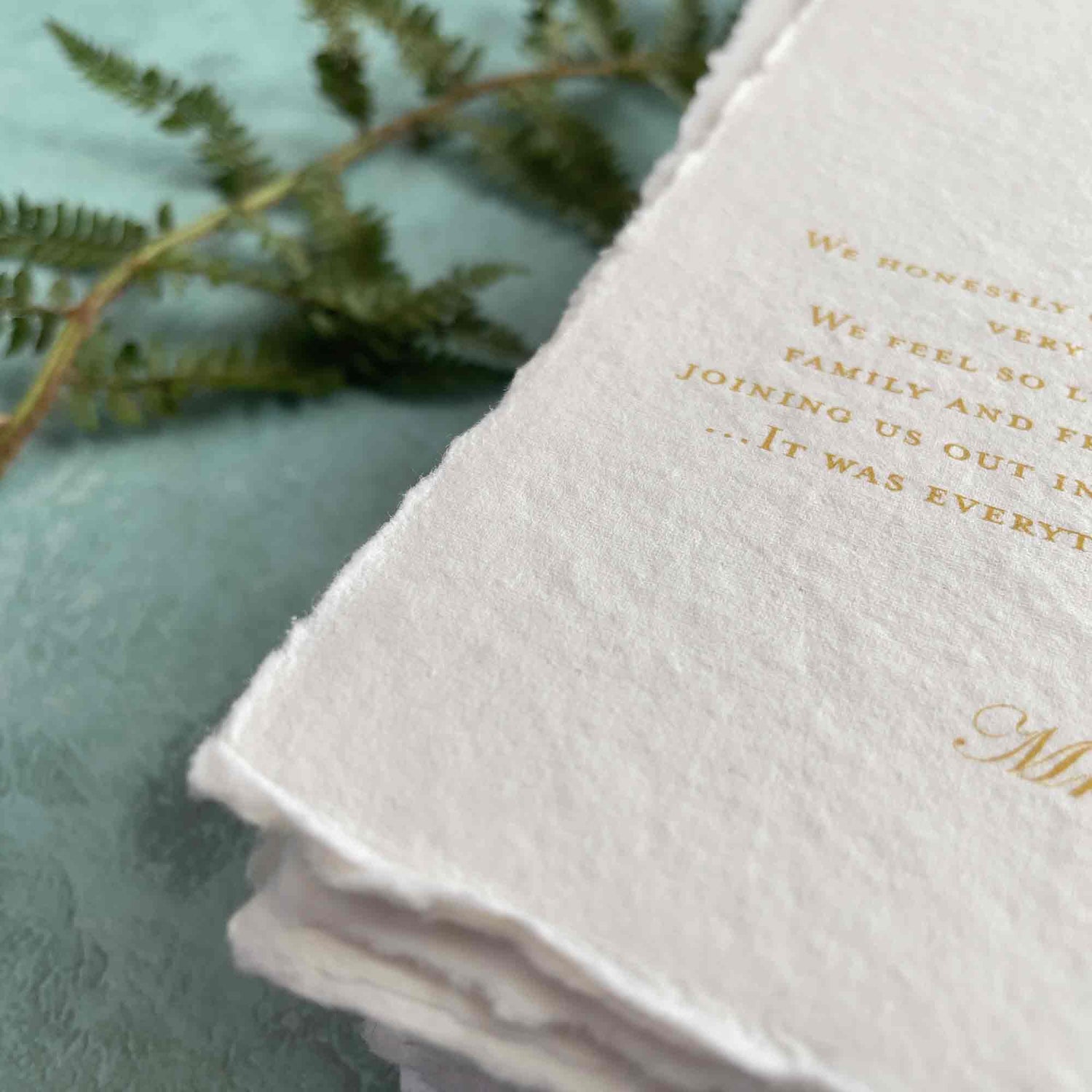 Printing on deckle edge handmade cotton rag paper.