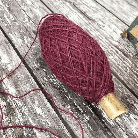 Flaxcord in a burgundy colour.  Natural string for floristry, gift wrapping and crafts.  Biodegradable hemp string for gardening.  By The Natural Paper Company