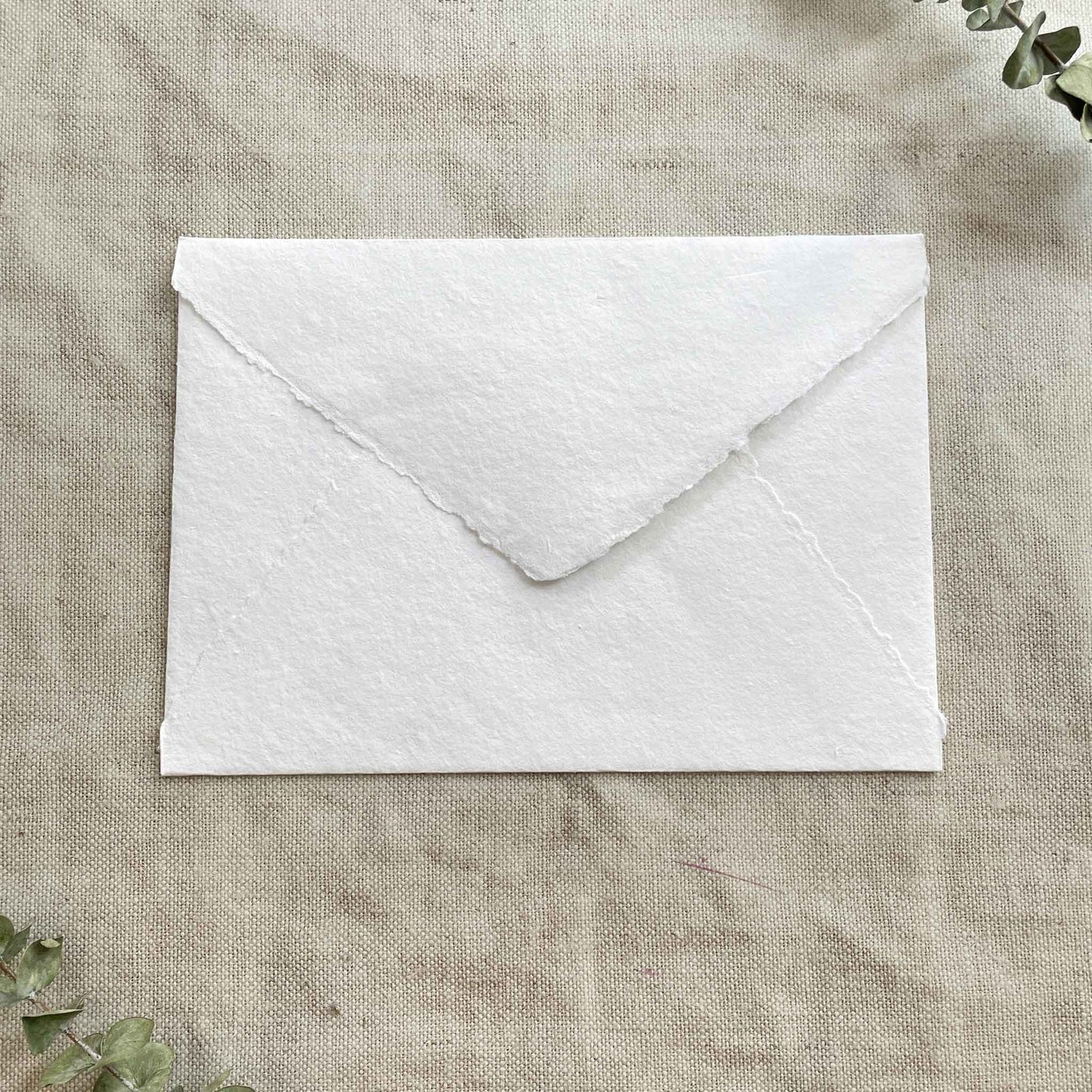 C5 envelope with deckled edge.  Handmade cotton rag paper envelope in white