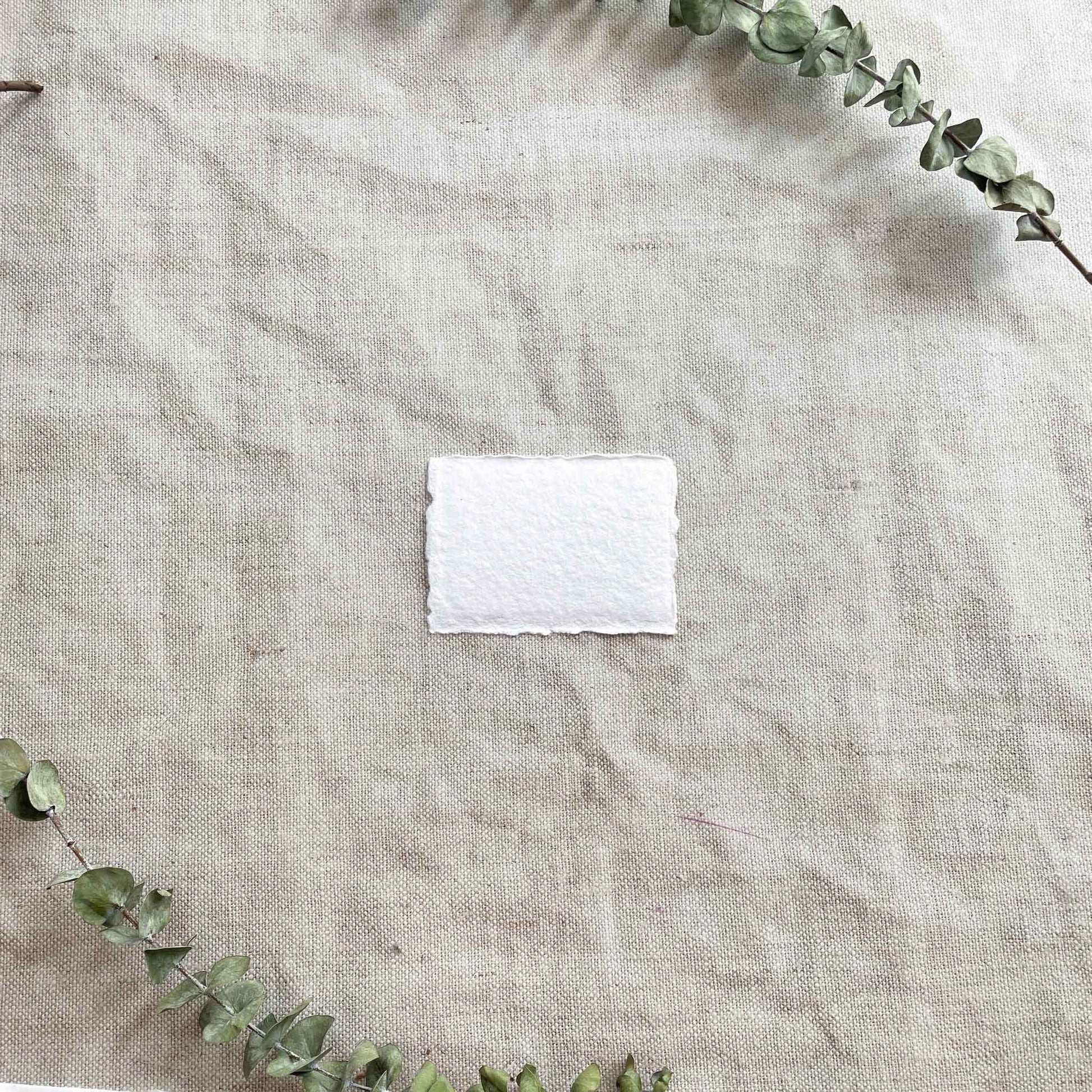 White handmade cotton rag paper place cards with deckled edges