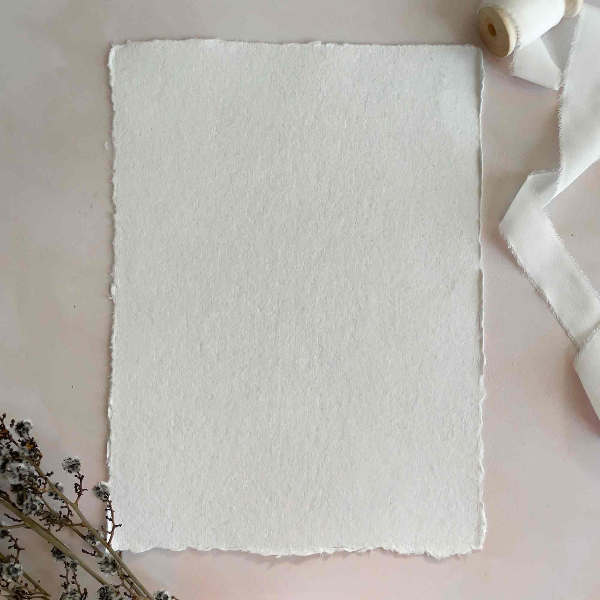 A4 handmade cotton rag paper with deckled edges.  By The Natural Paper Company