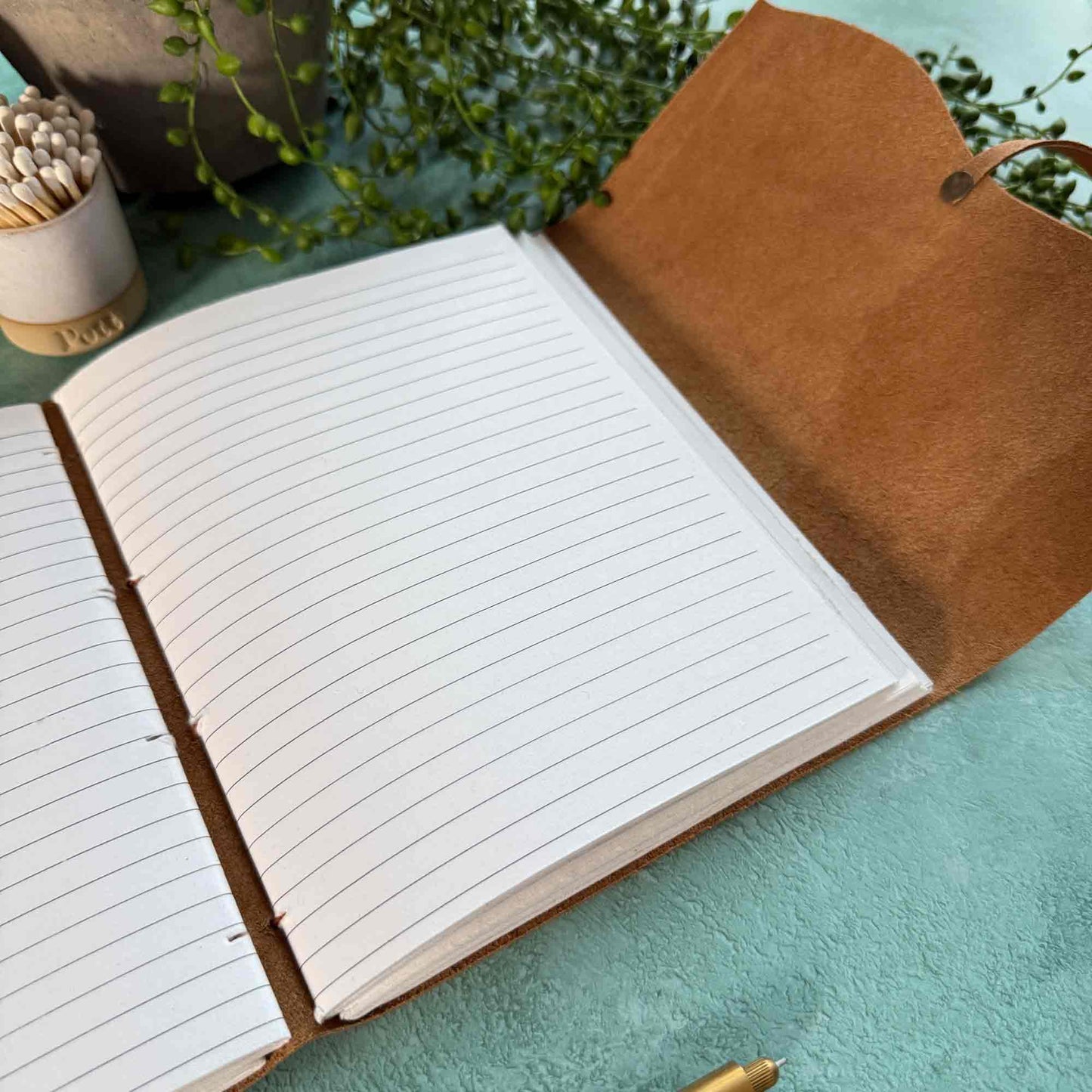 handmade tan leather notebook with lined pages