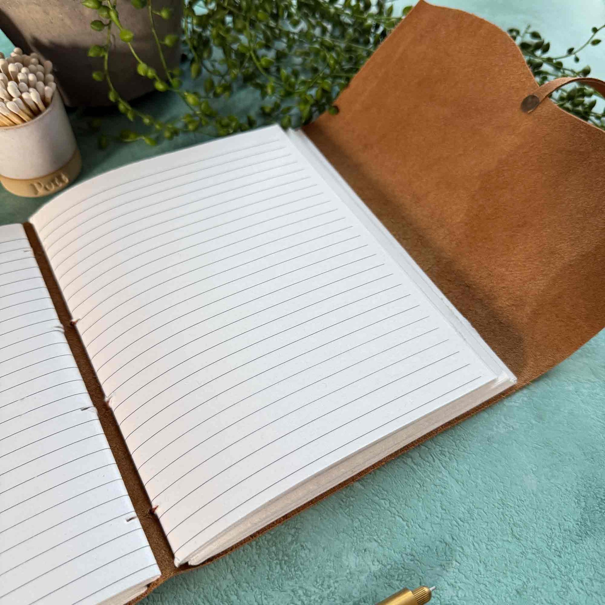handmade tan leather notebook with lined pages