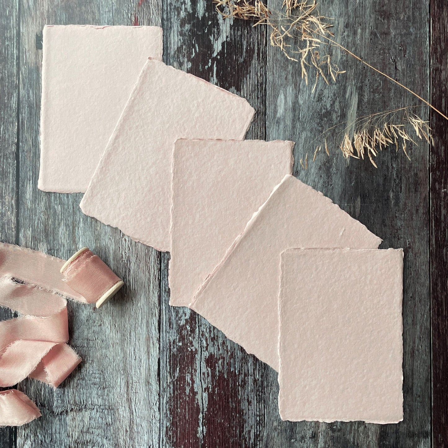 A6 size handmade paper with a deckled edge.  Blush pink recycled cotton rag paper for invitations and stationery.  By The Natural Paper Company