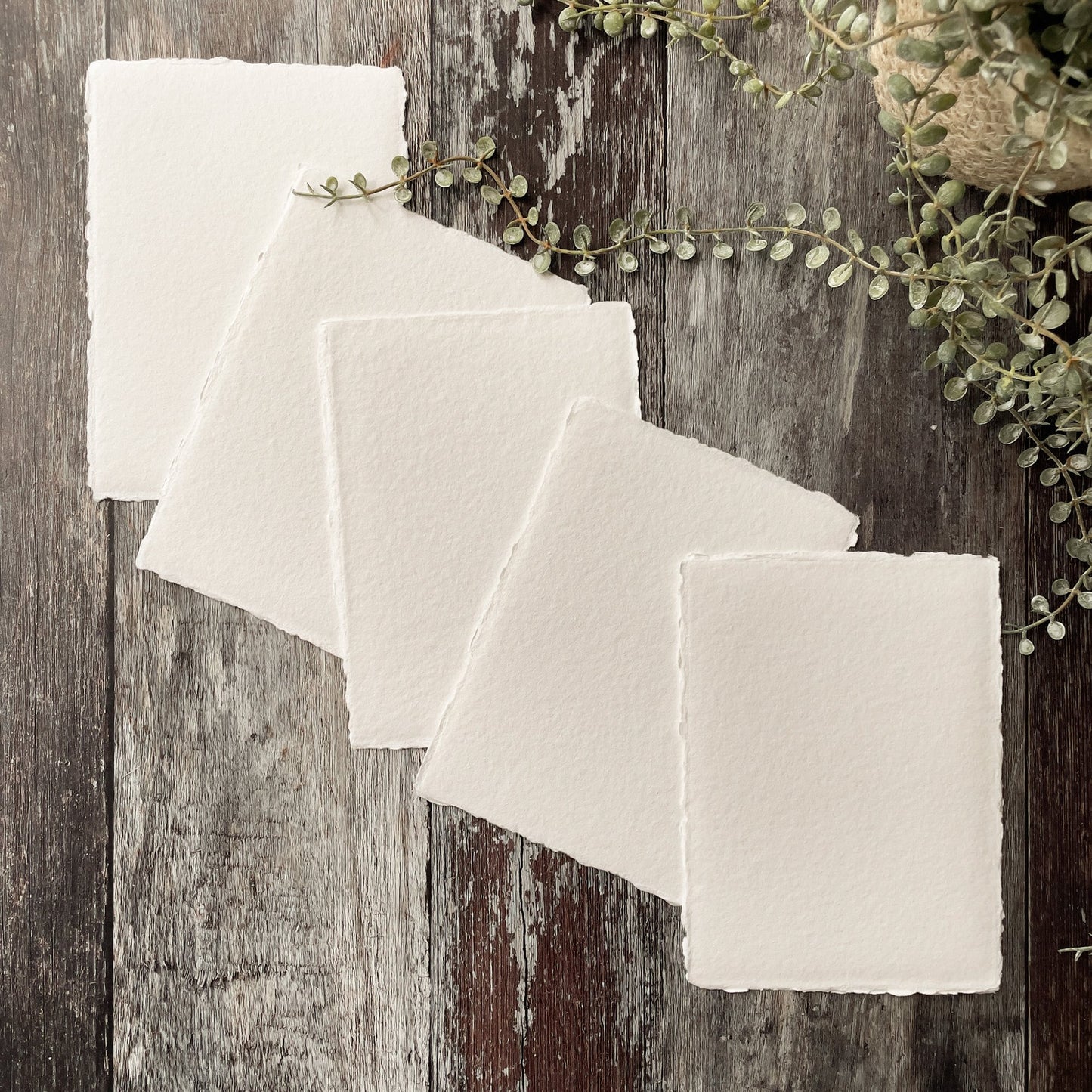 Premium white handmade recycled paper with a deckled edge.  Handmade paper for watercolour painting, invitations, card making, calligraphy and crafts.  By The Natural paper Company