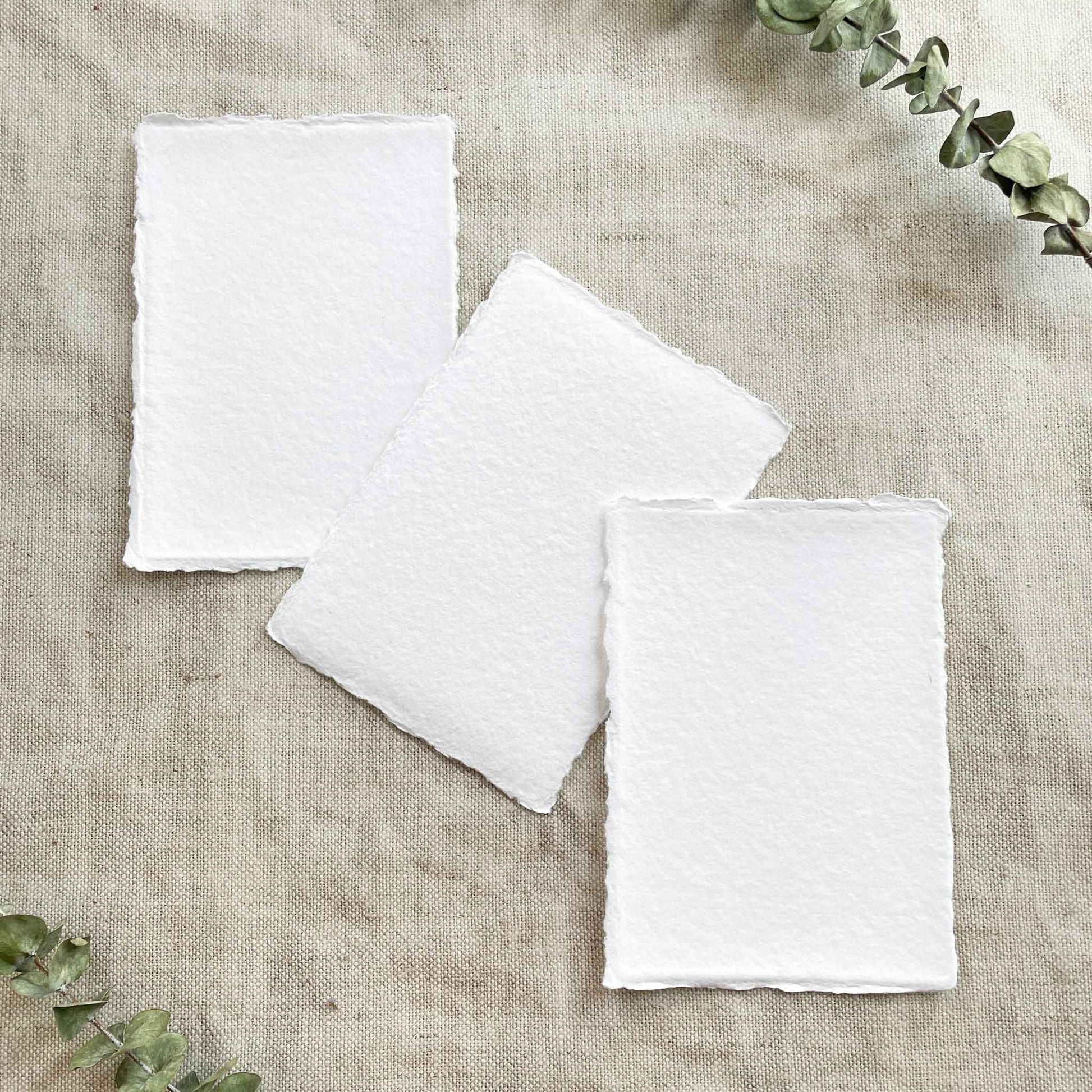 White recycled cotton rag paper with deckled edges.  A6 size handmade paper and card