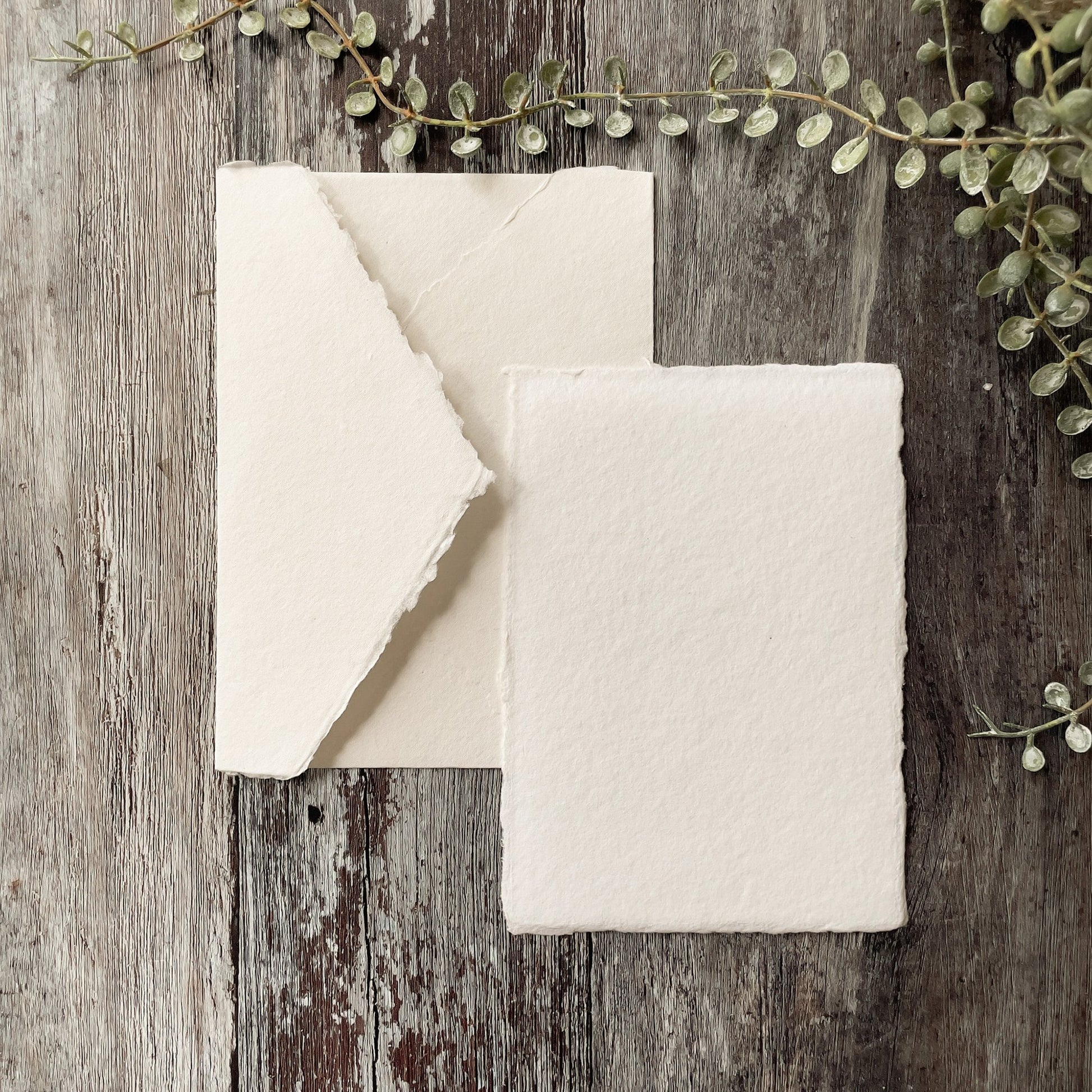 A6 handmade paper card and envelopes in white.  Card and envelopes made from recycled cotton rag paper with a deckled edge.  Perfect for invitations and card making.  By The Natural paper Company