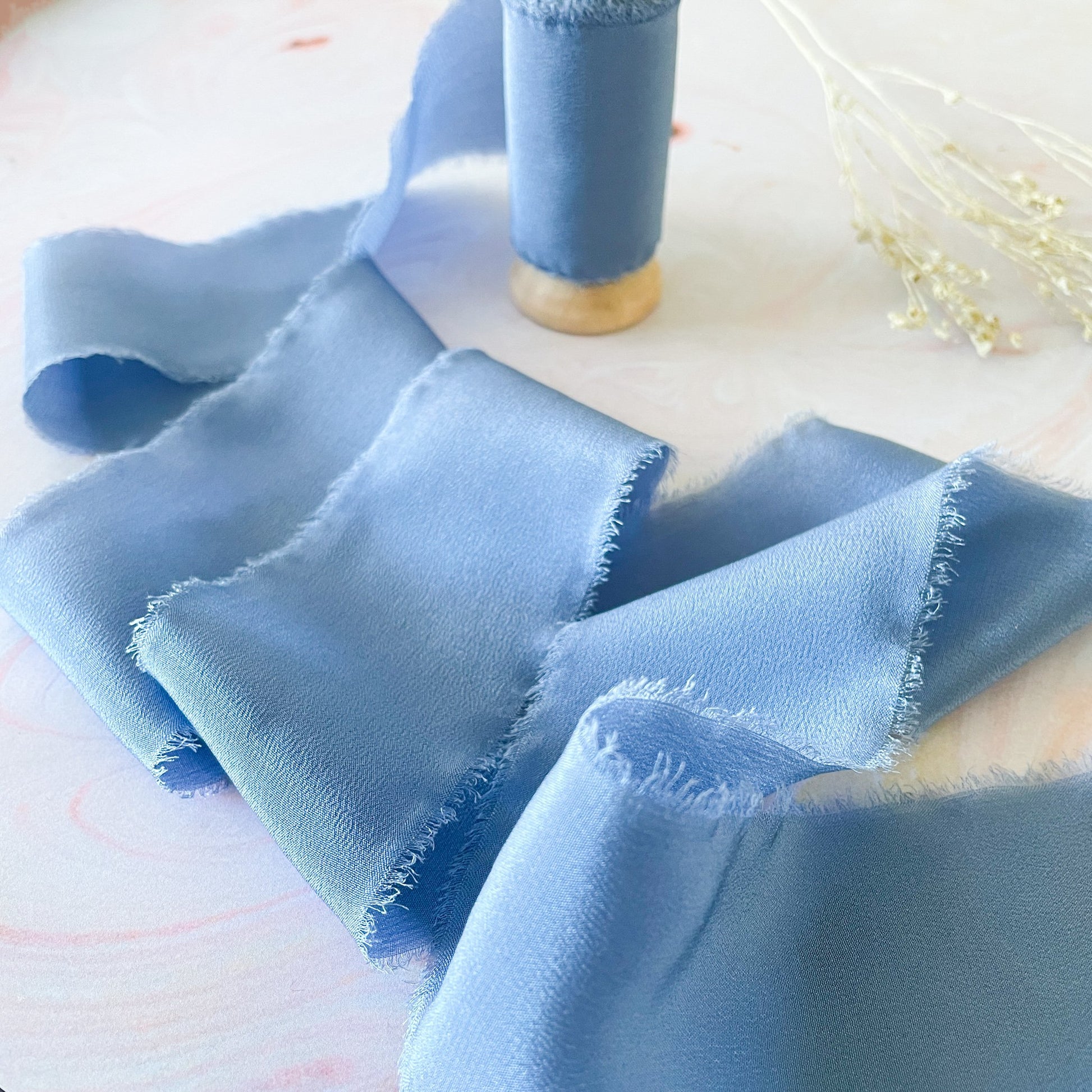 Blue silk ribbon for crafts.  Luxury silk ribbon with frayed edges.  By The Natural Paper Company.