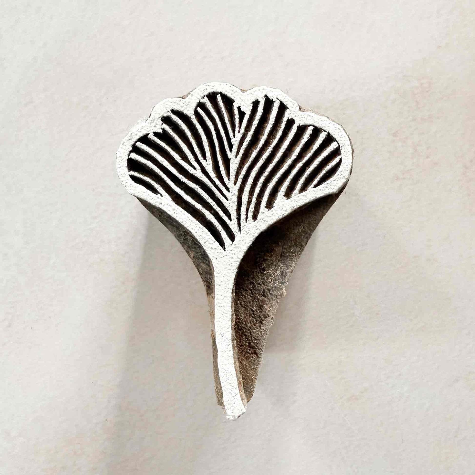 Alaria Indian wood block stamp with hand-carved fan-shaped botanical design, 5cm x 3.5cm