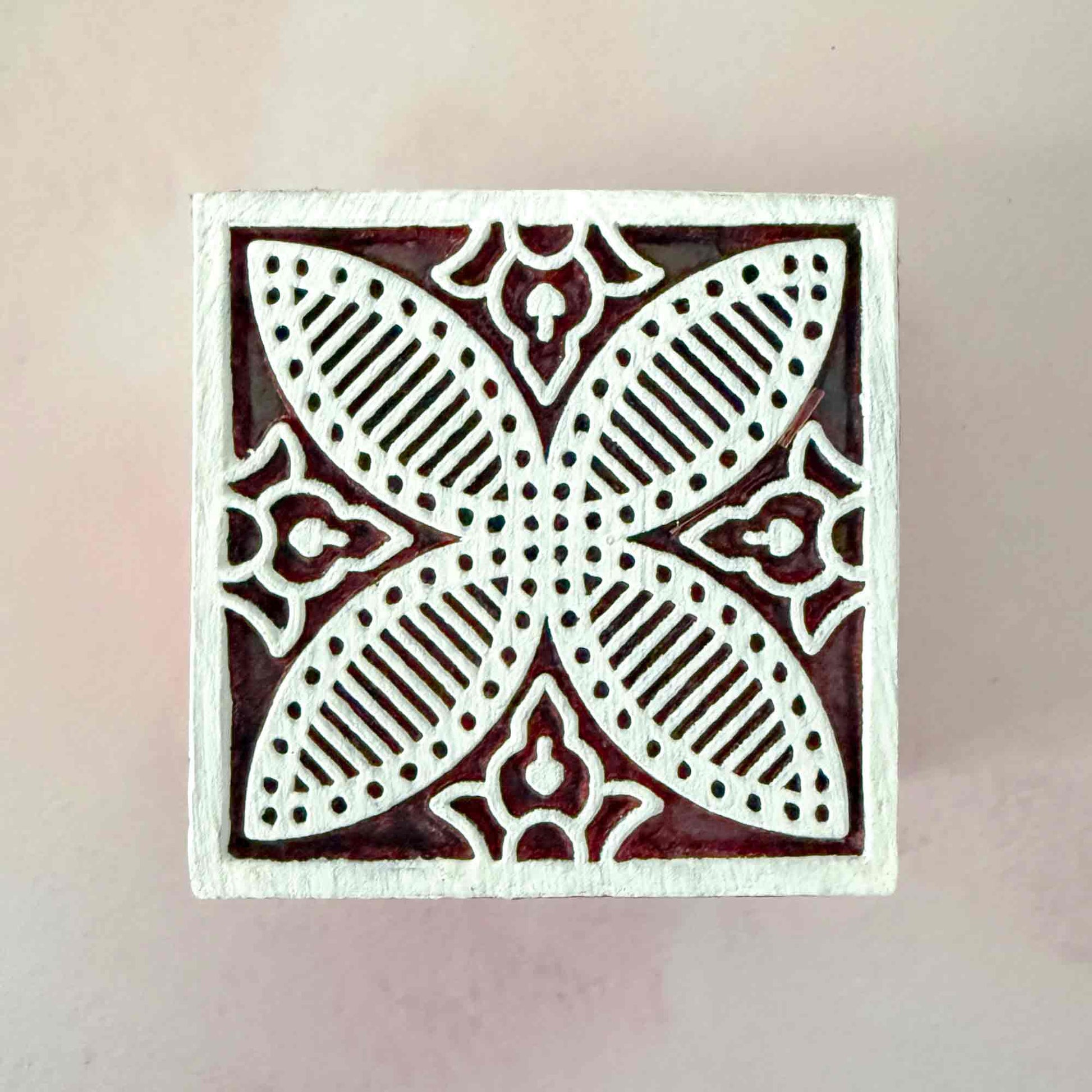 Indian wood block stamp with a geometric tile design.  