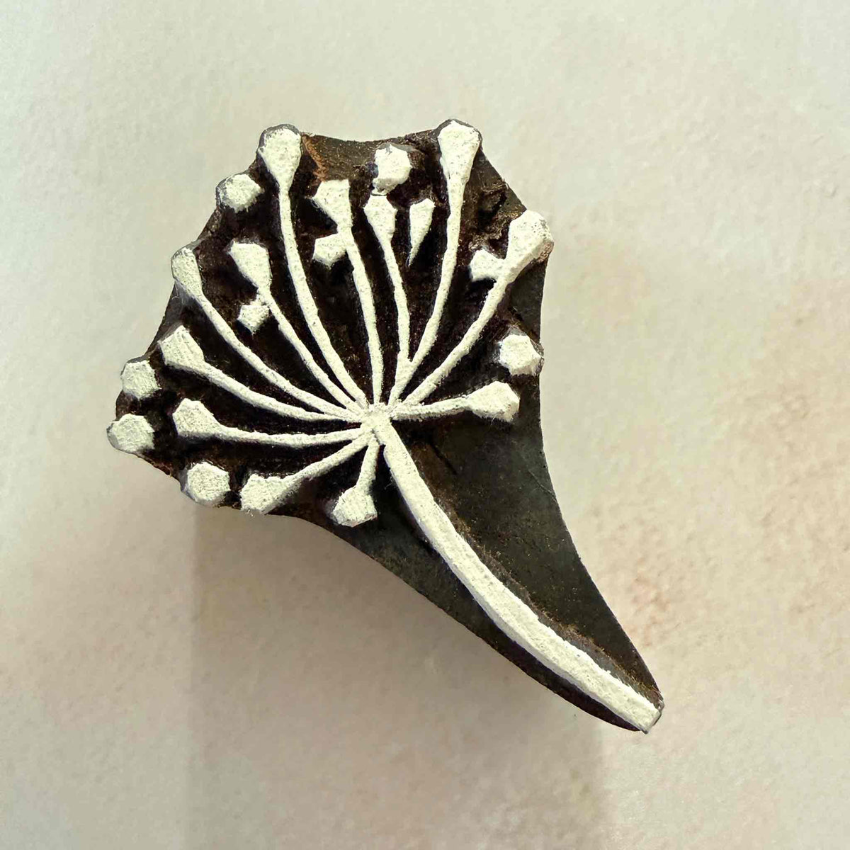 Side view of Ammi Indian Wood Block Stamp showing hand-carved floral design