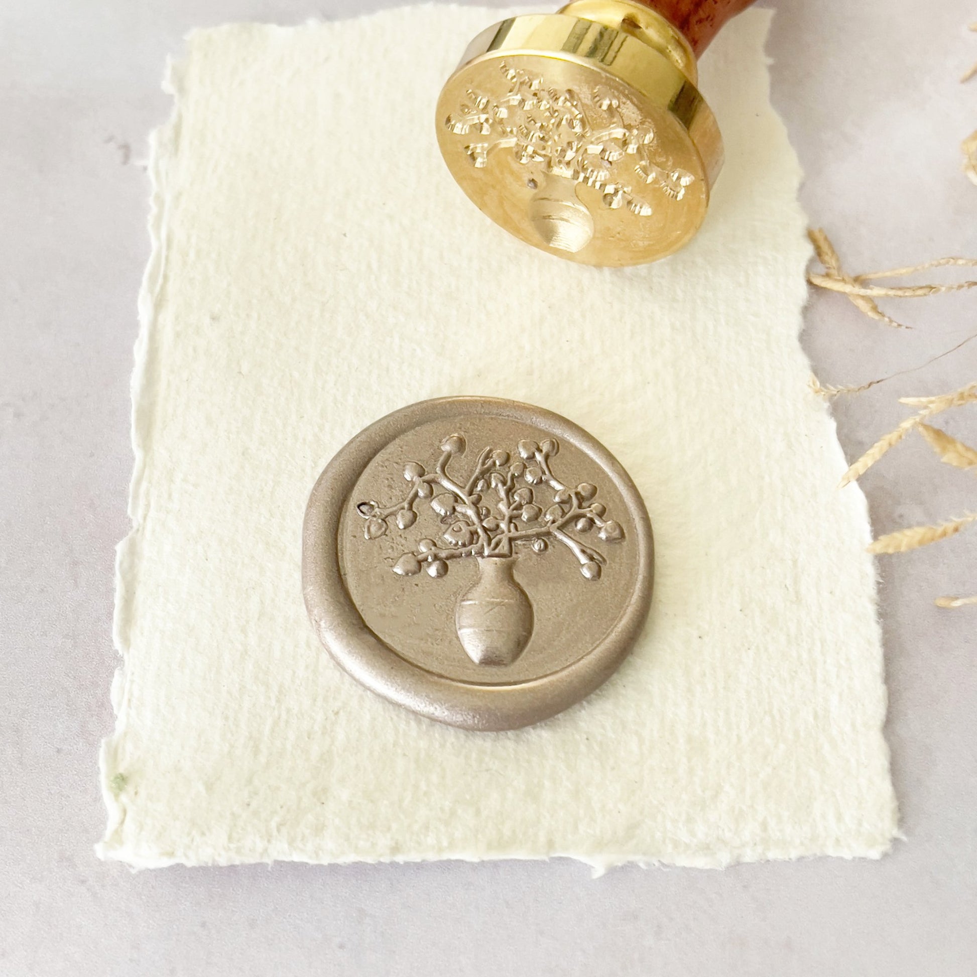 Sealing wax stamp with a vase design.  Traditional style wax seal stamp for decorating wedding invitations, stationery, envelopes, packaging and more.  By The Natural Paper Company