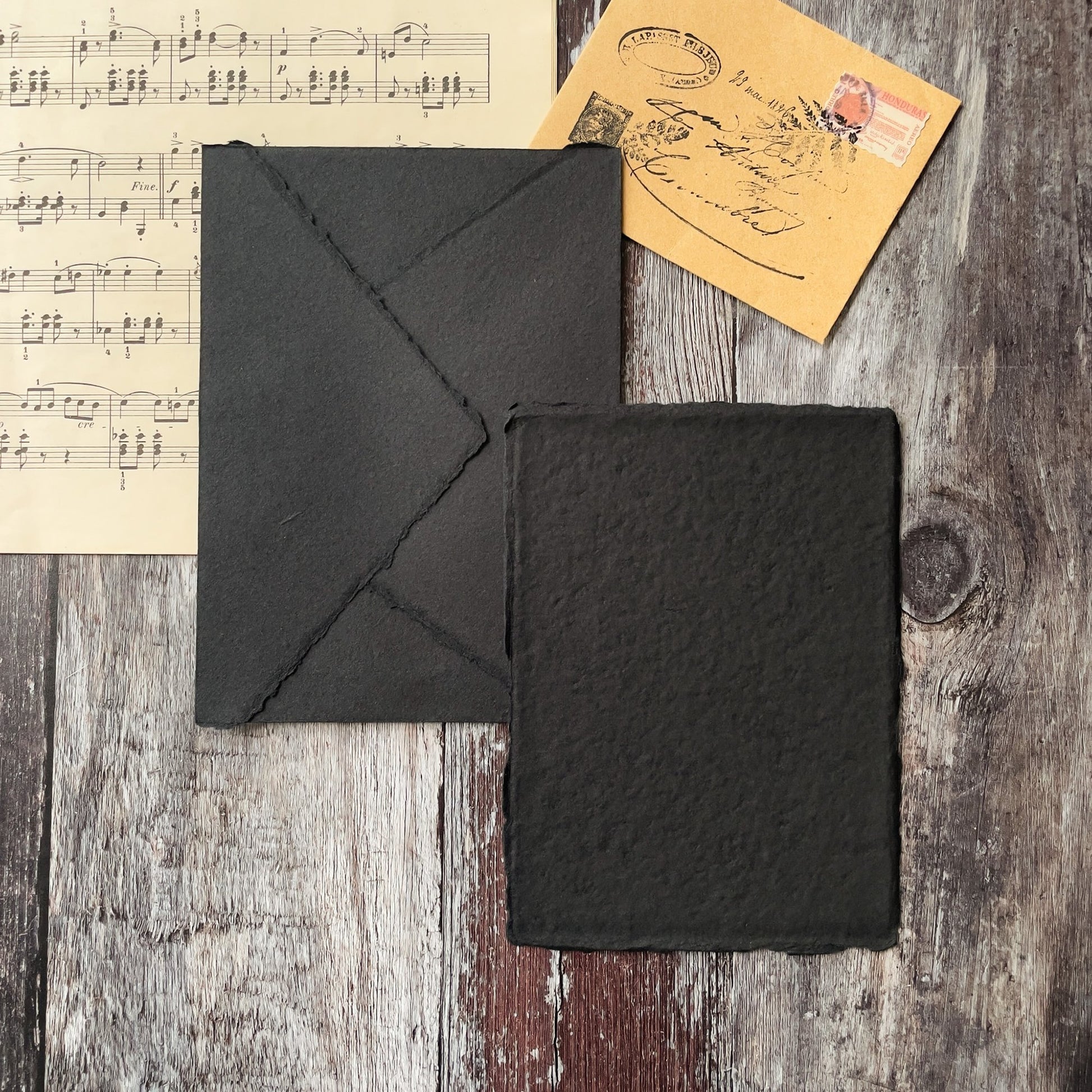 Black Card and Envelope made from handmade recycled cotton rag paper.  Deckle edge invitation card and envelope in black.  Perfect for calligraphy and watercolour painting.  By The Natural paper Company