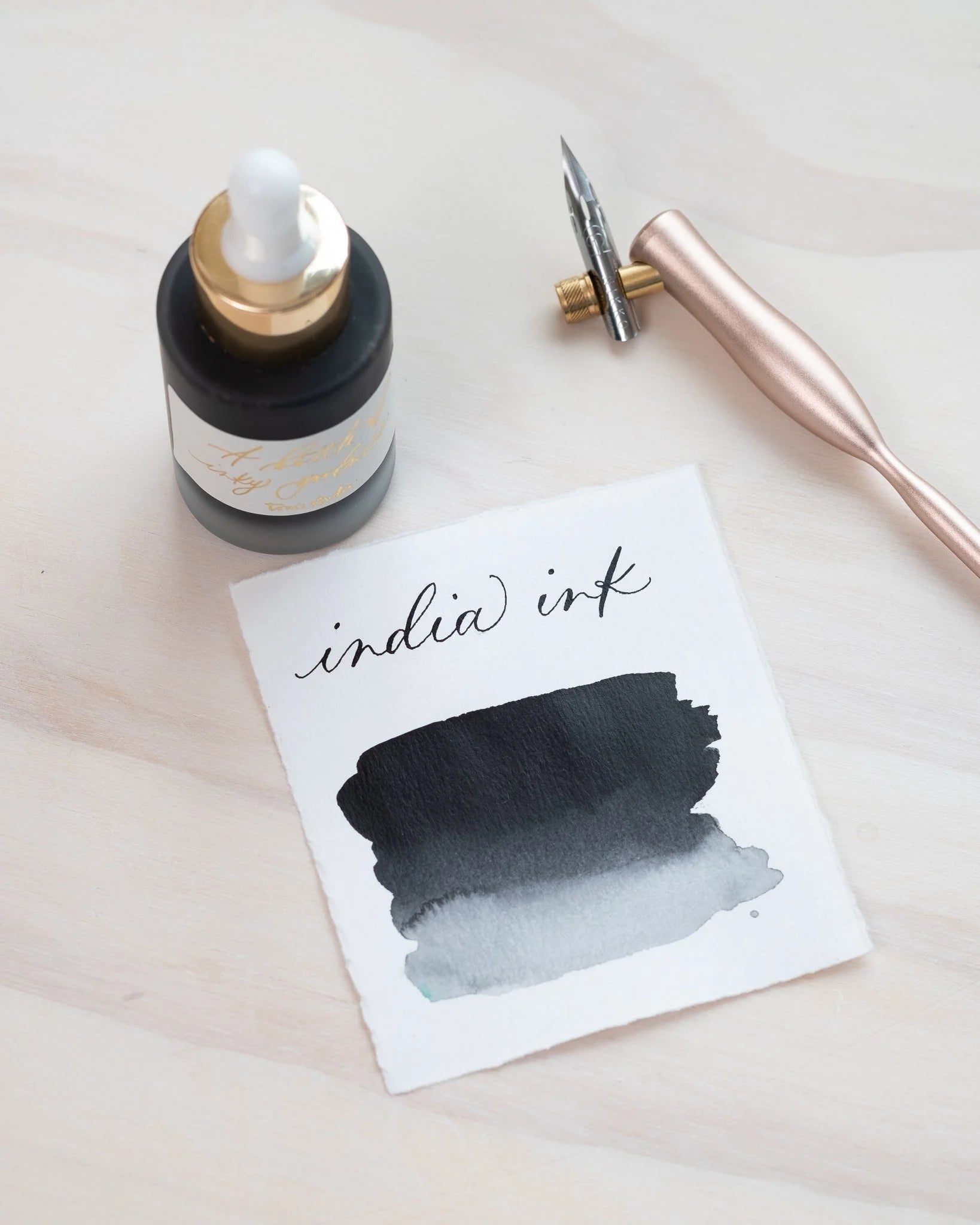 Black India Ink by Tom's Studio.  Acrylic based ink for calligraphy.