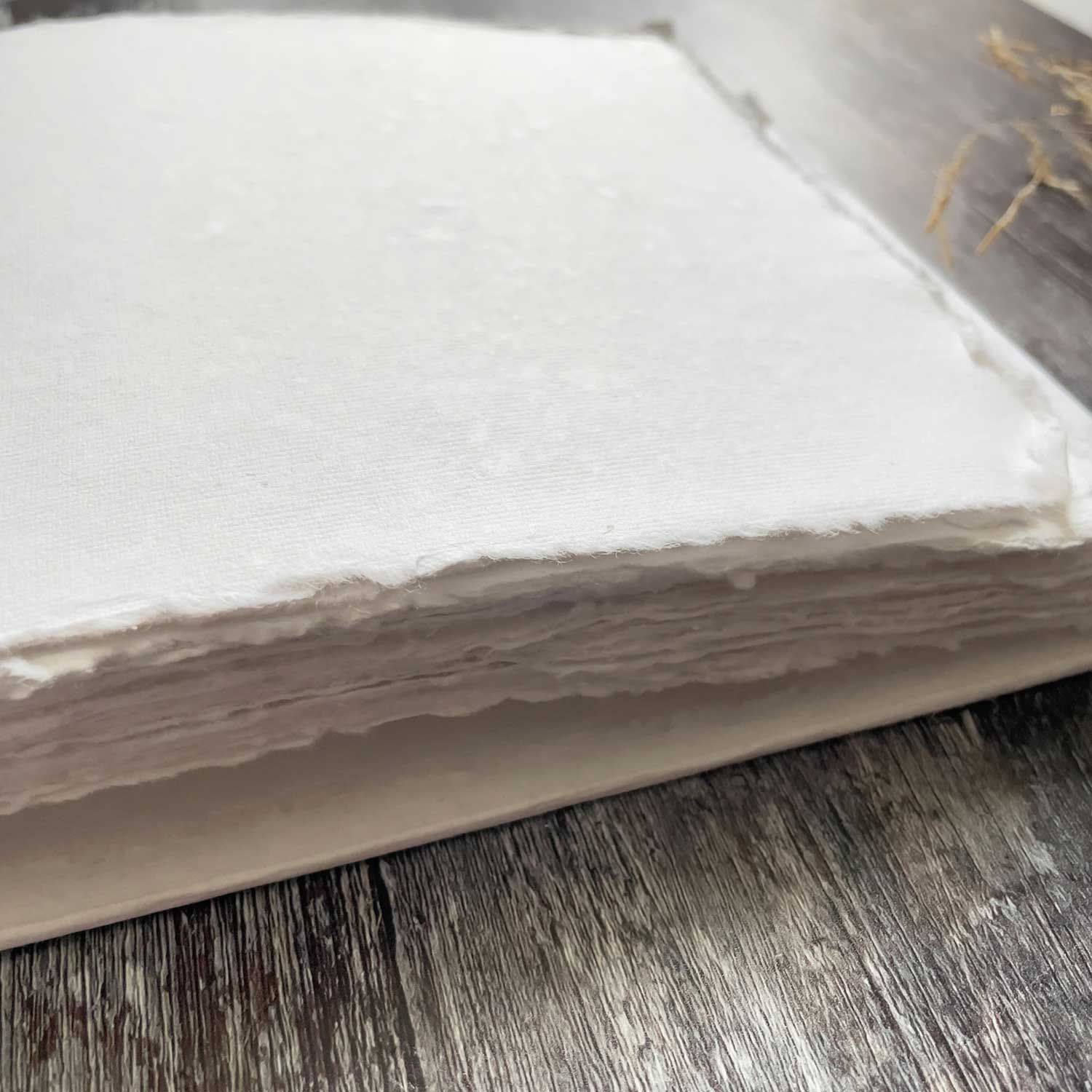 Blank guest book with handmade paper pages.  By The Natural Paper Company