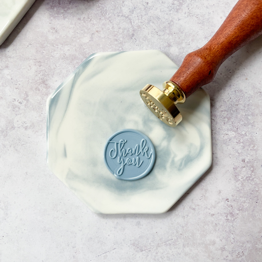 ceramic wax stamping mat in blue marble finish.  Mat to make wax seals.