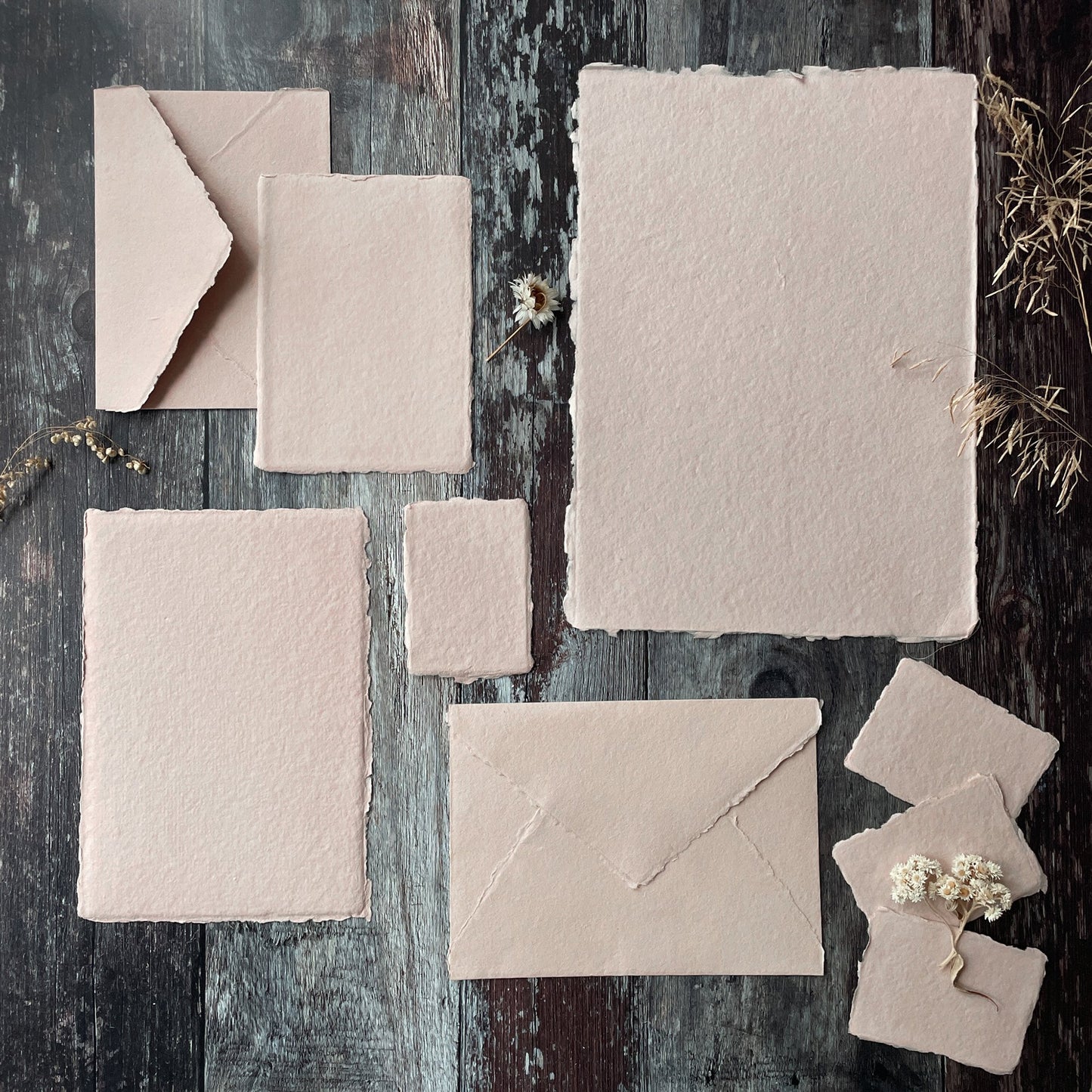 Blush pink handmade recycled paper, card and envelopes made from cotton rag fibres.  Deckled edges.  By The Natural Paper Company