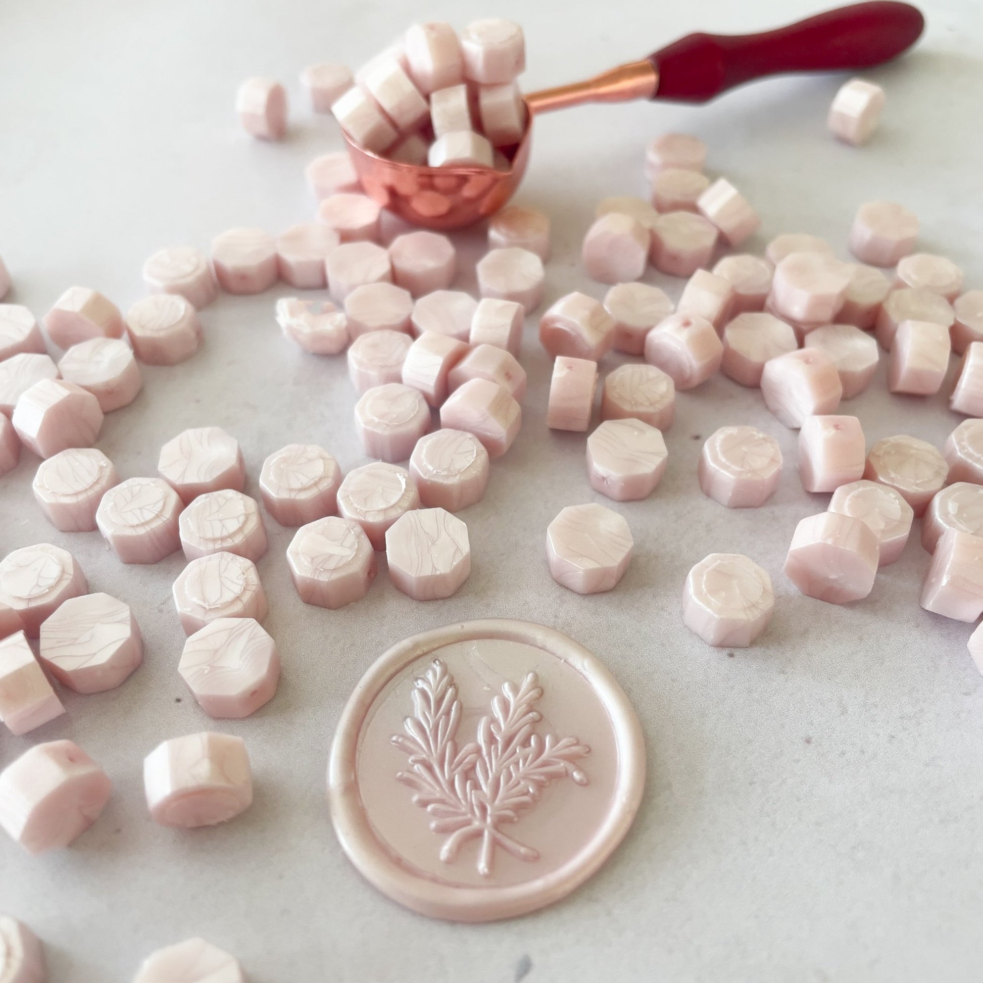 Wax seal beads in blush pink.  Eco friendly sealing wax by The Natural Paper Company