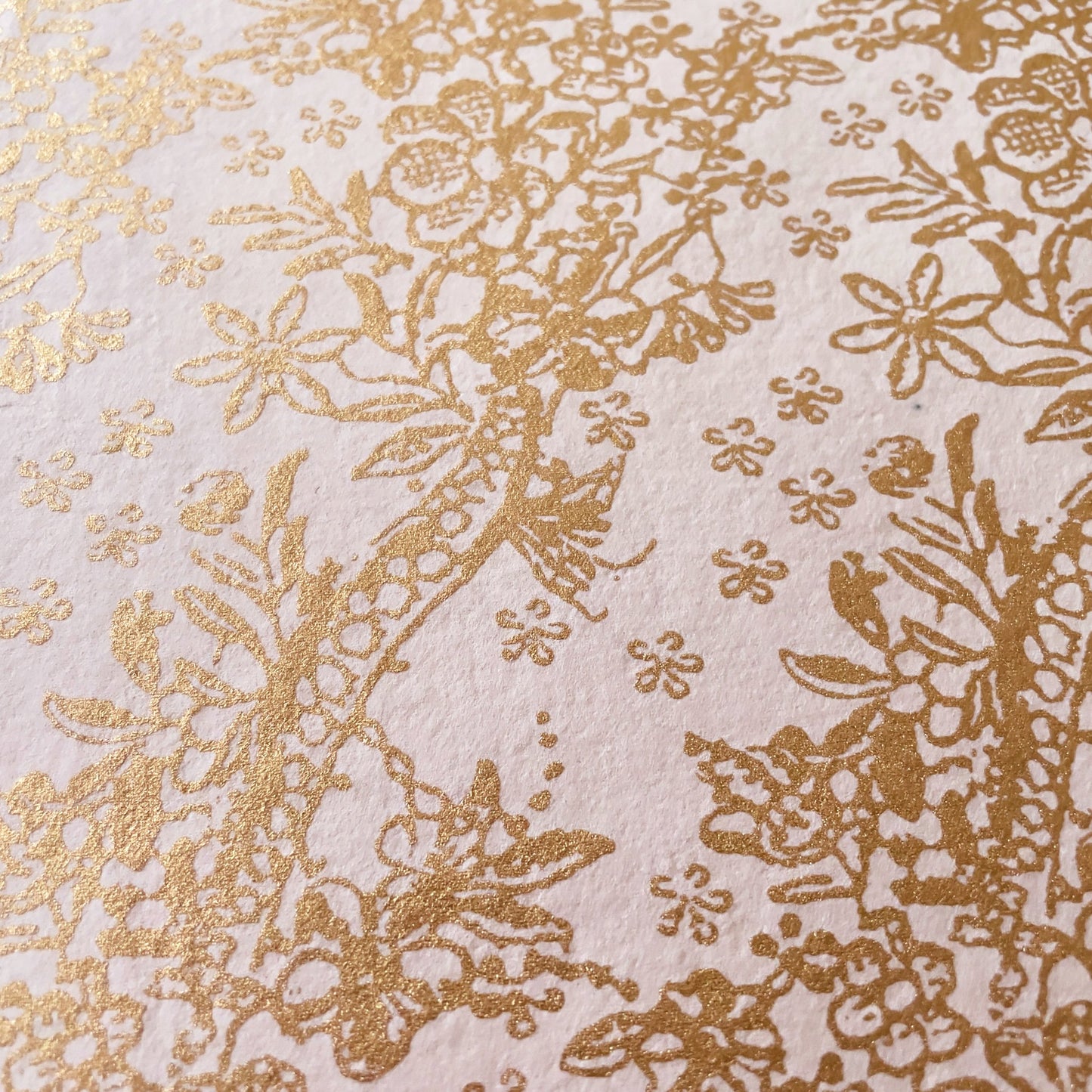 Pretty recycled paper with a gold pattern.  Blush pink and gold patterned sheets of A recycled paper.  Perfect for arts and crafts.  by The Natural Paper Company