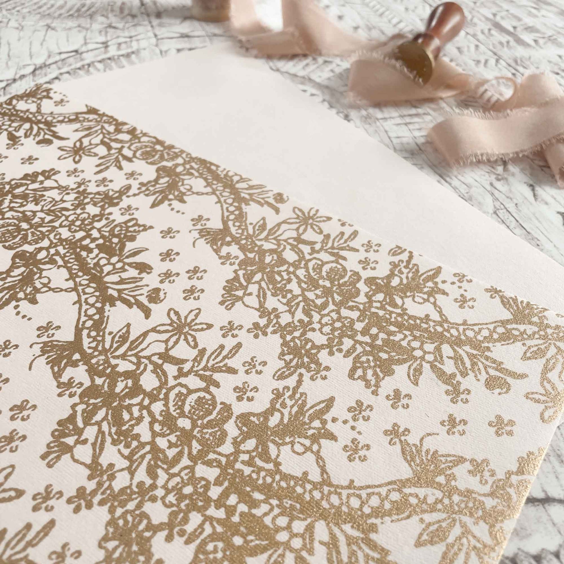 Blush pink and gold recycled paper with floral pattern