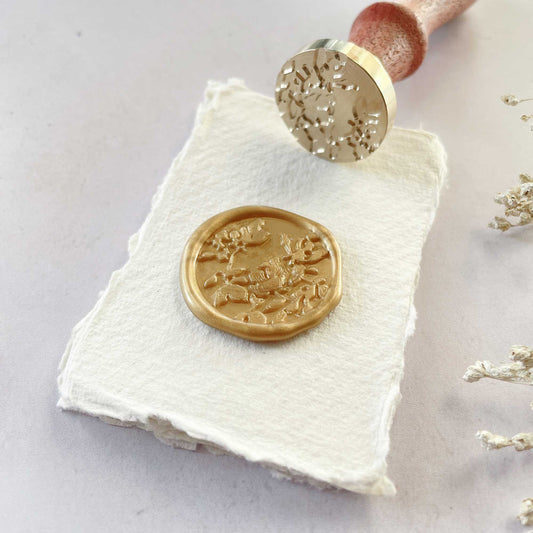 Botanica Sealing Wax Stamp with a flowery design.  Pretty floral wax seals for wedding invitations and stationery.  Perfect to use as envelope seals and for gift packaging.  By The Natural Paper Company