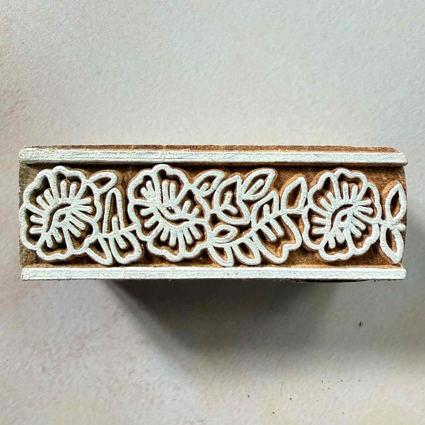 block printing stamp with flowery border pattern