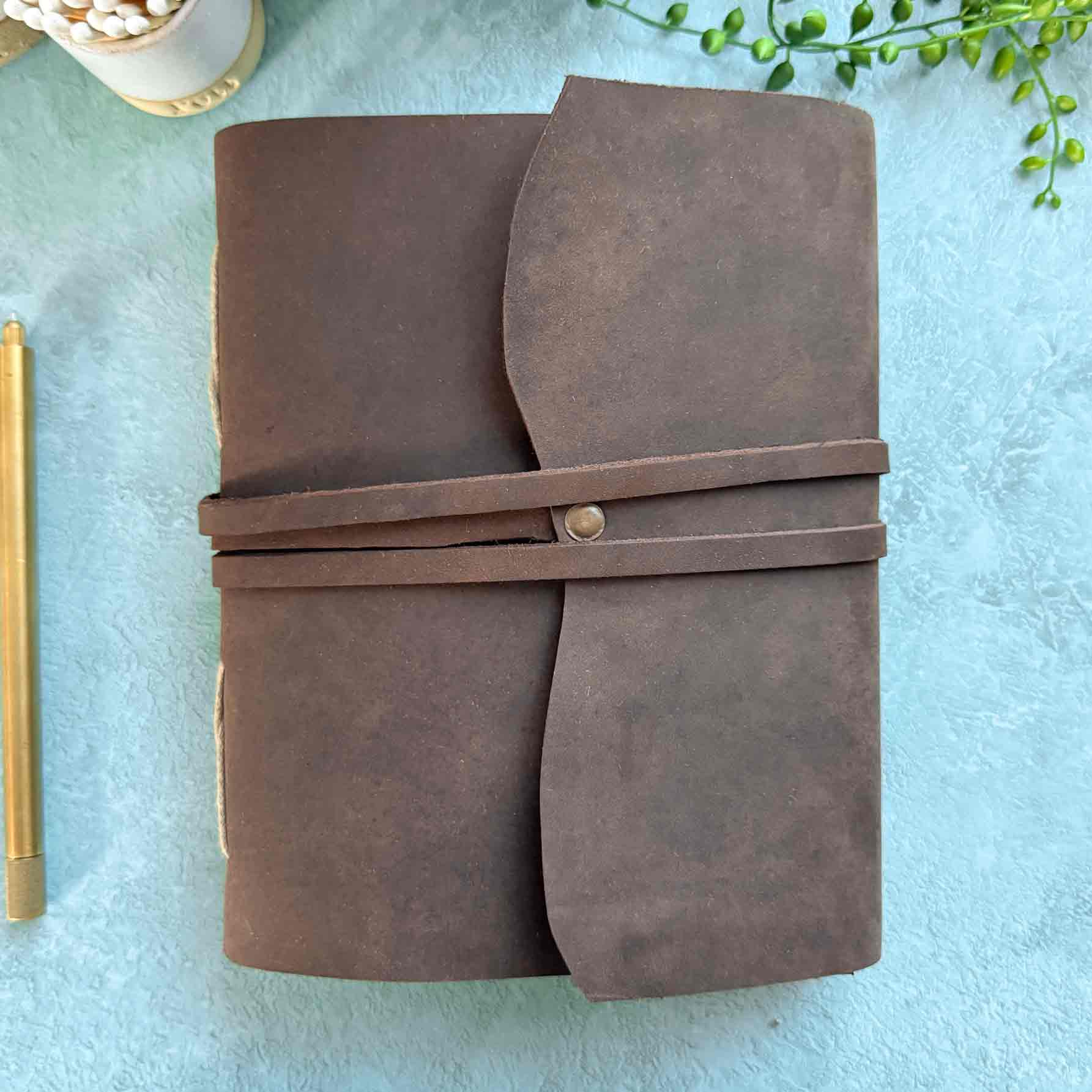 handmade notebook with a brown leather cover