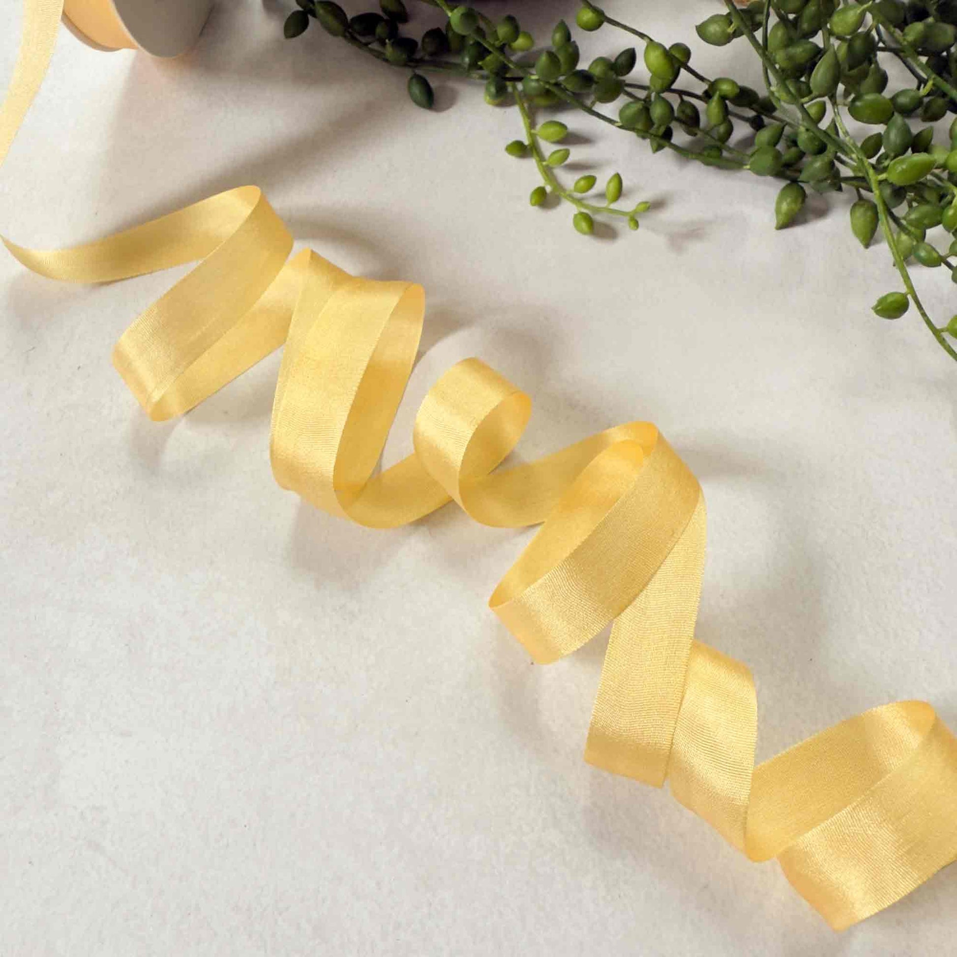 Narrow silk ribbon 1cm wide in a lemon yellow colour